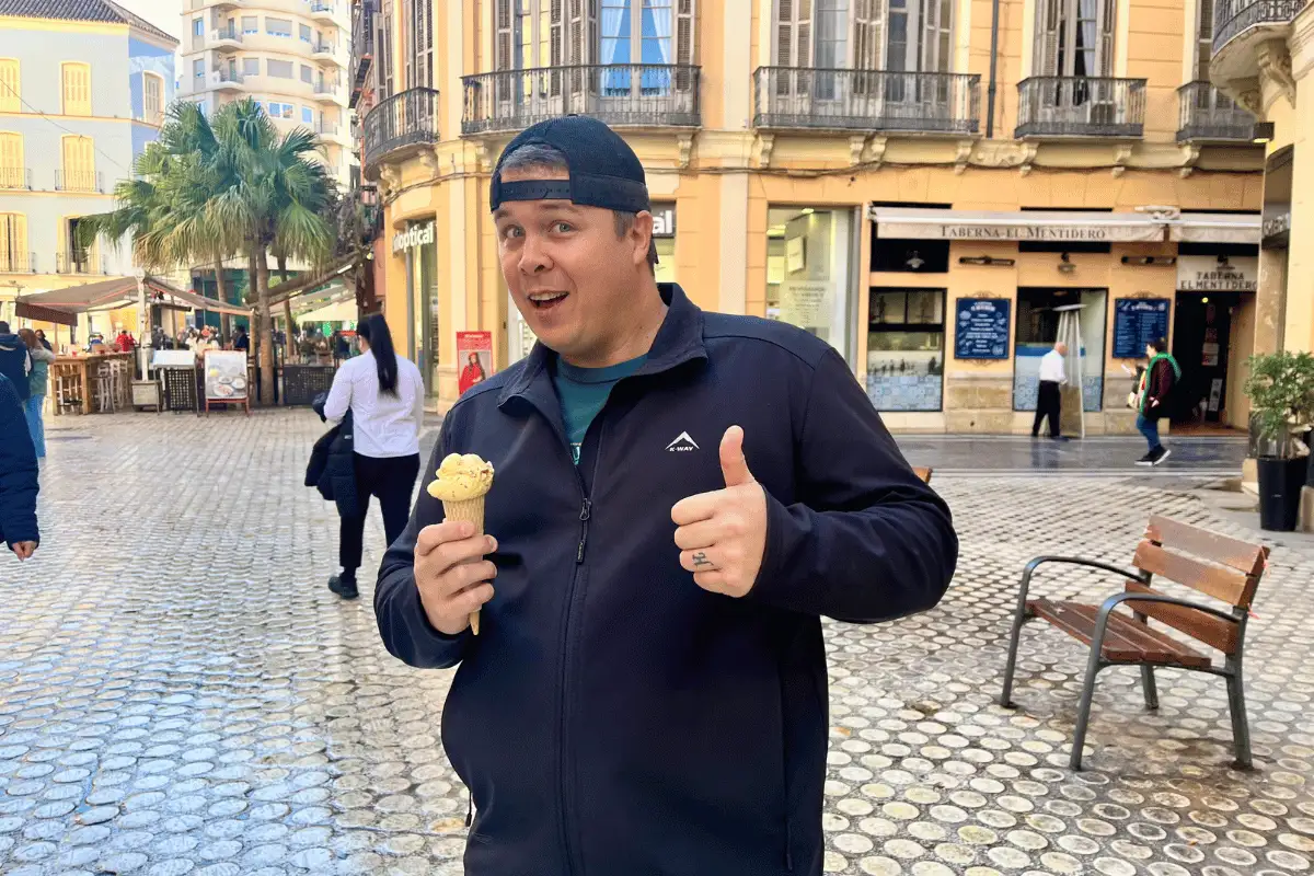 Malaga-flavour ice cream scoops in a cone