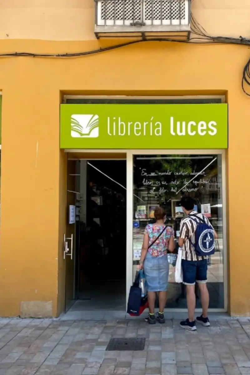 The storefront of Librería Luces, an independent bookshop in Málaga