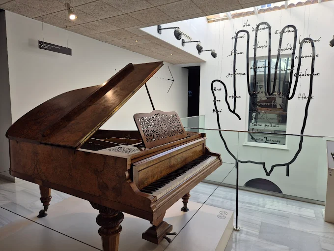 Visitors playing traditional instruments at the MIMMA Interactive Music Museum in Malaga