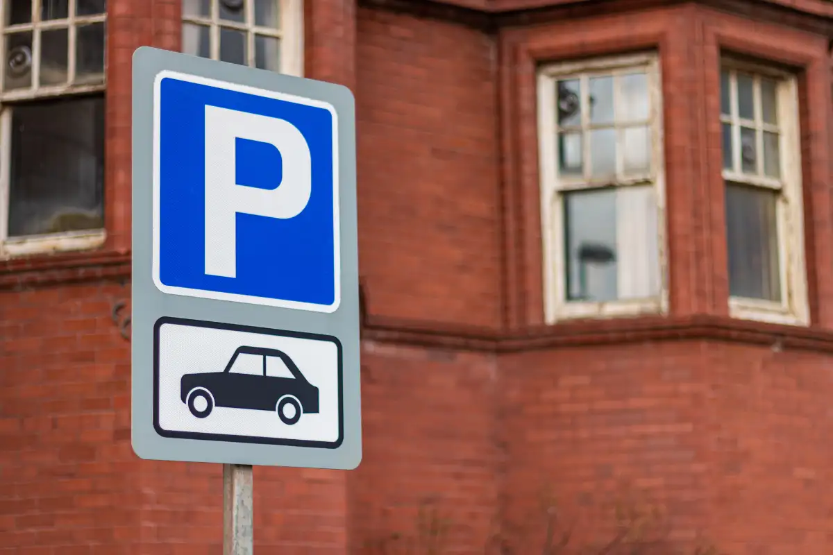 Blue-line SARE paid parking zone on a Malaga street