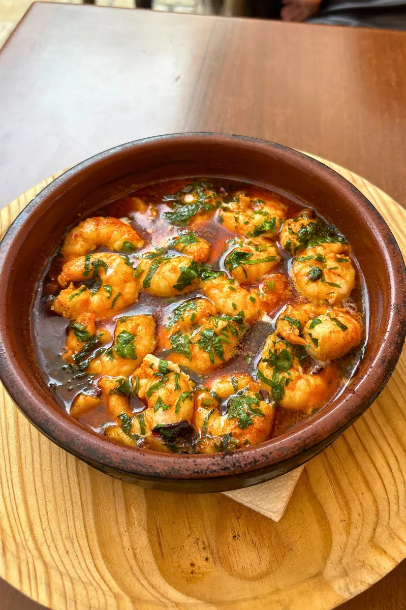 Gambas al pil pil sizzling in garlicky olive oil at Picasso Bar Málaga