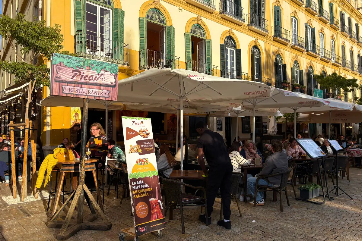 Outdoor terrace diners at Picasso restaurant on Plaza de la Merced in Málaga