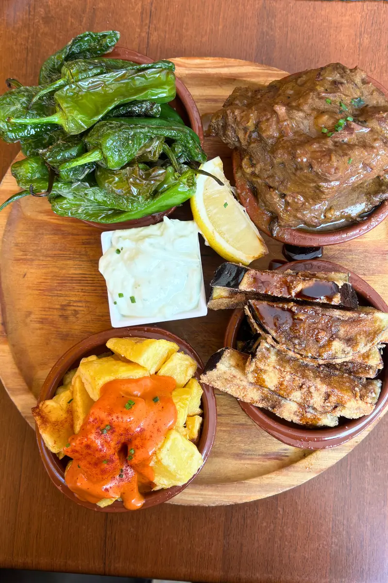Selection of tapas dishes on a table at Picasso Bar Málaga