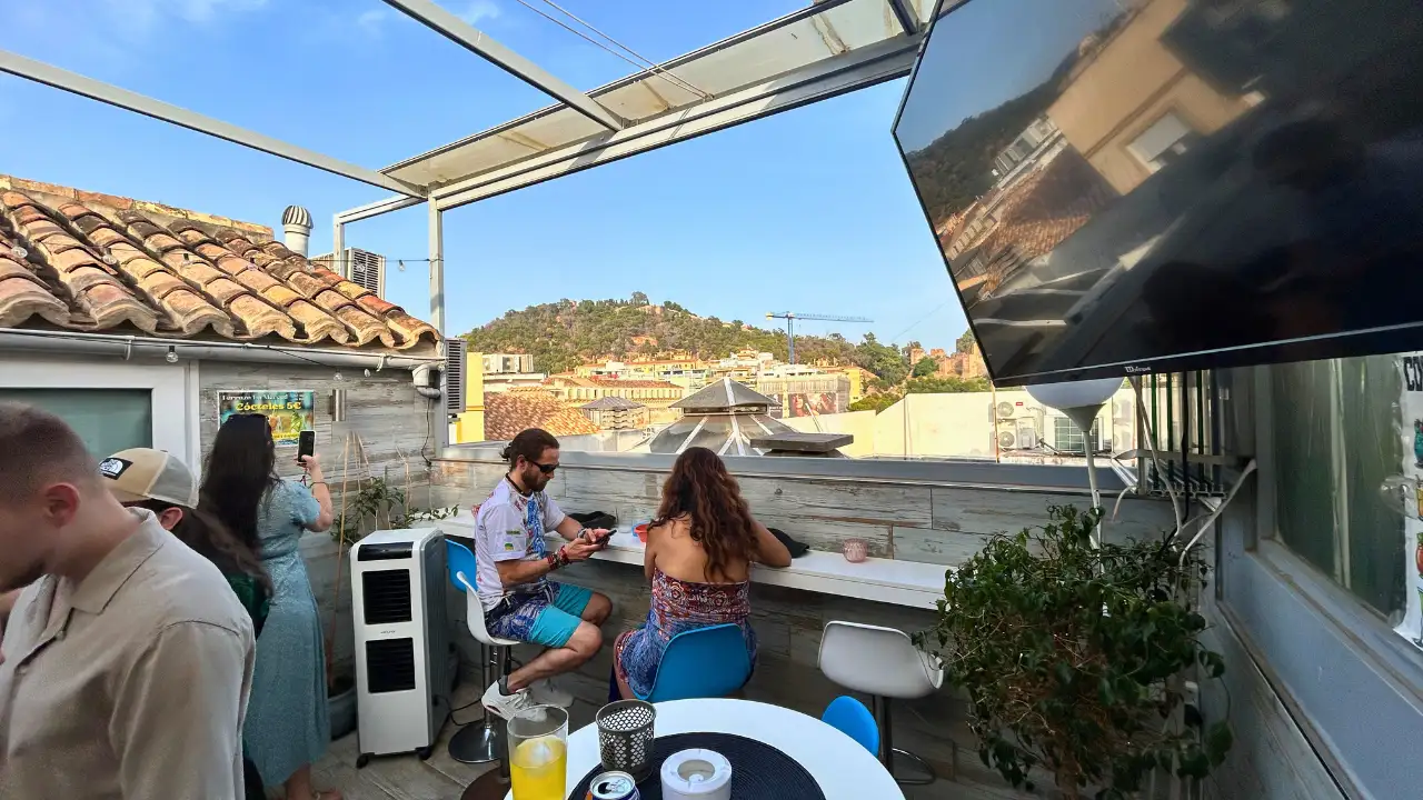 Rooftop bar at La Terraza de la Merced with views over Malaga at night