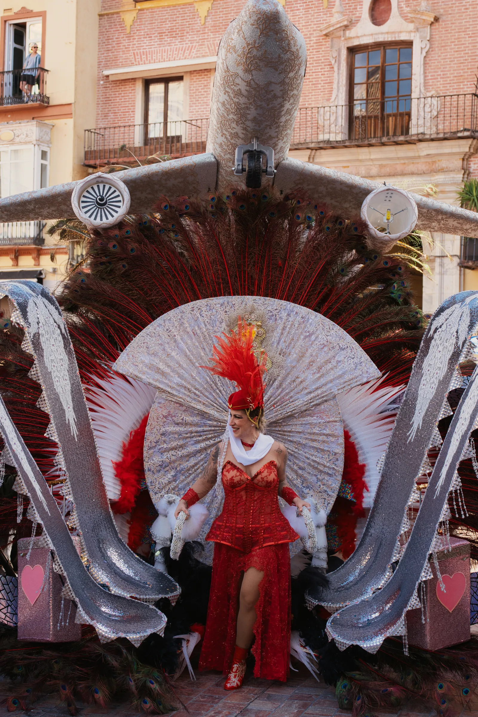 Marching band parading through Alicante streets during Hogueras de San Juan festival
