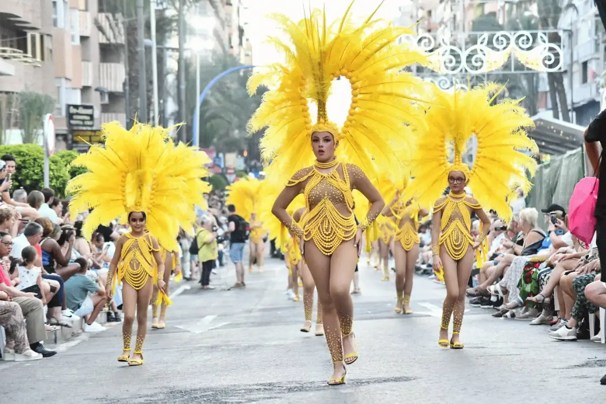 Costumed performers in a San Juan festival parade in Malaga