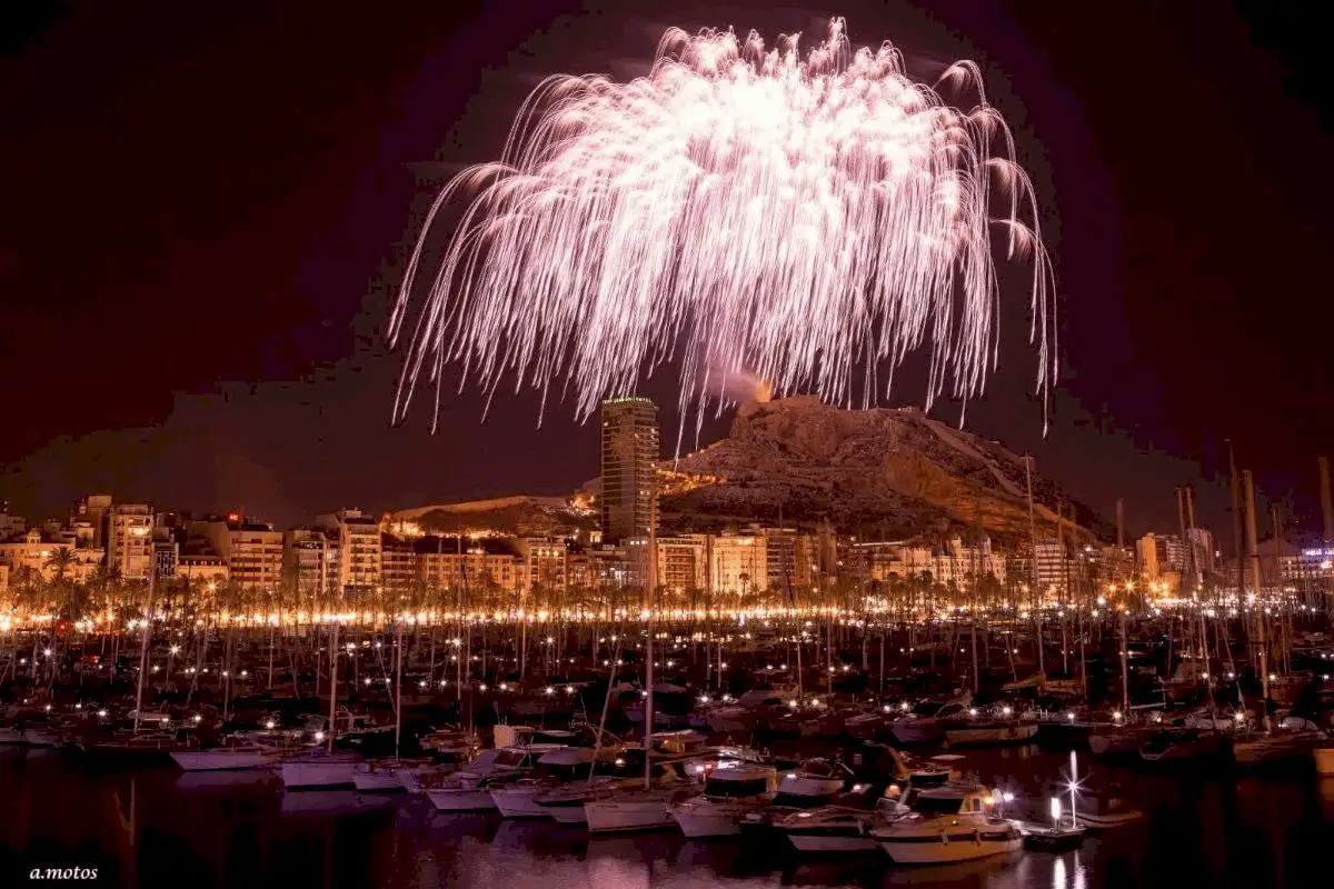 Fireworks lighting up the night sky over Alicante during Hogueras de San Juan