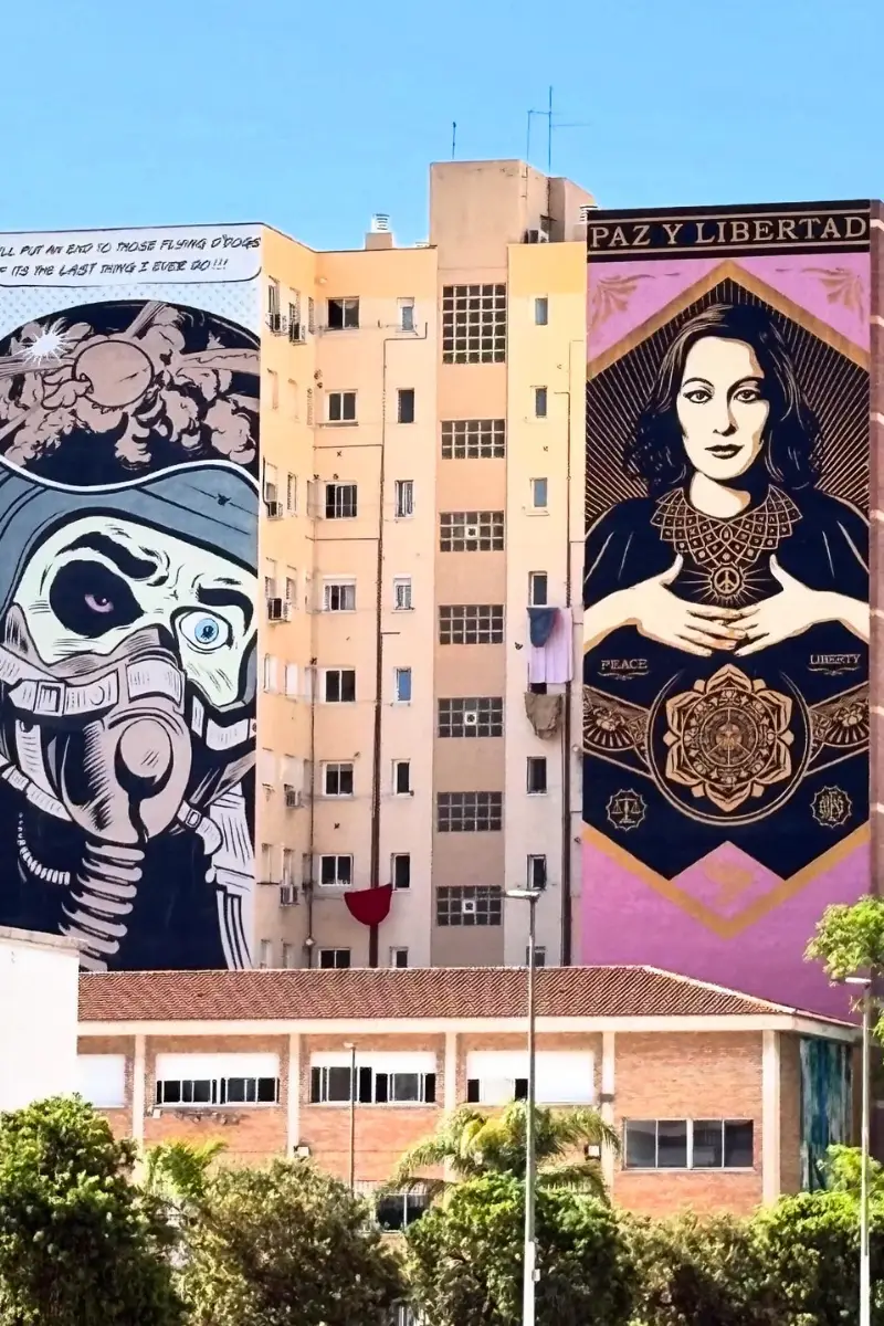 Colourful large-scale street mural on a building in Malaga's Soho district