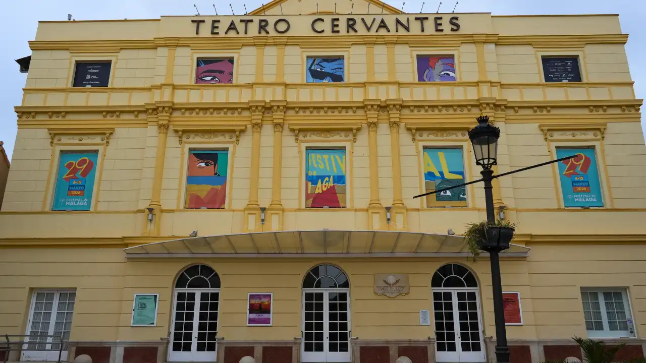 The facade of the Teatro Cervantes in Málaga lit up for a festival