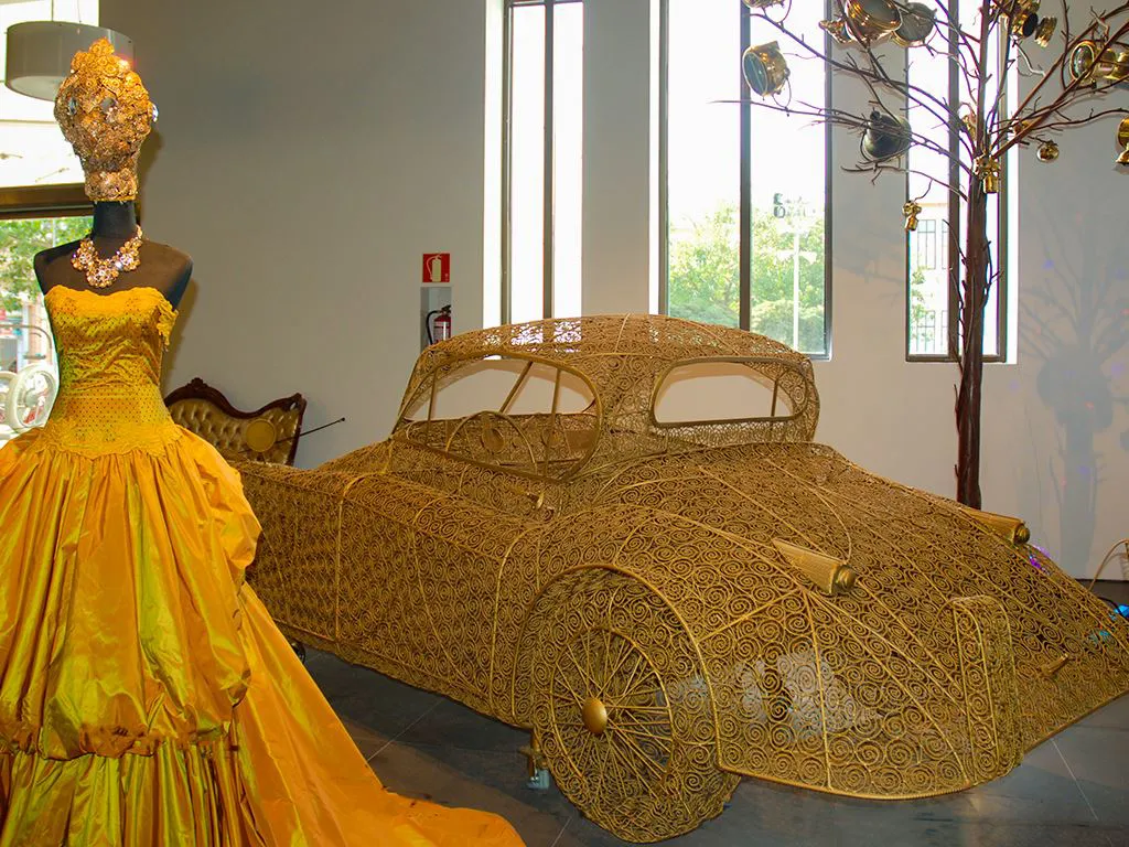 Wicker sculpture of a vintage car at the Automobile Museum in Málaga