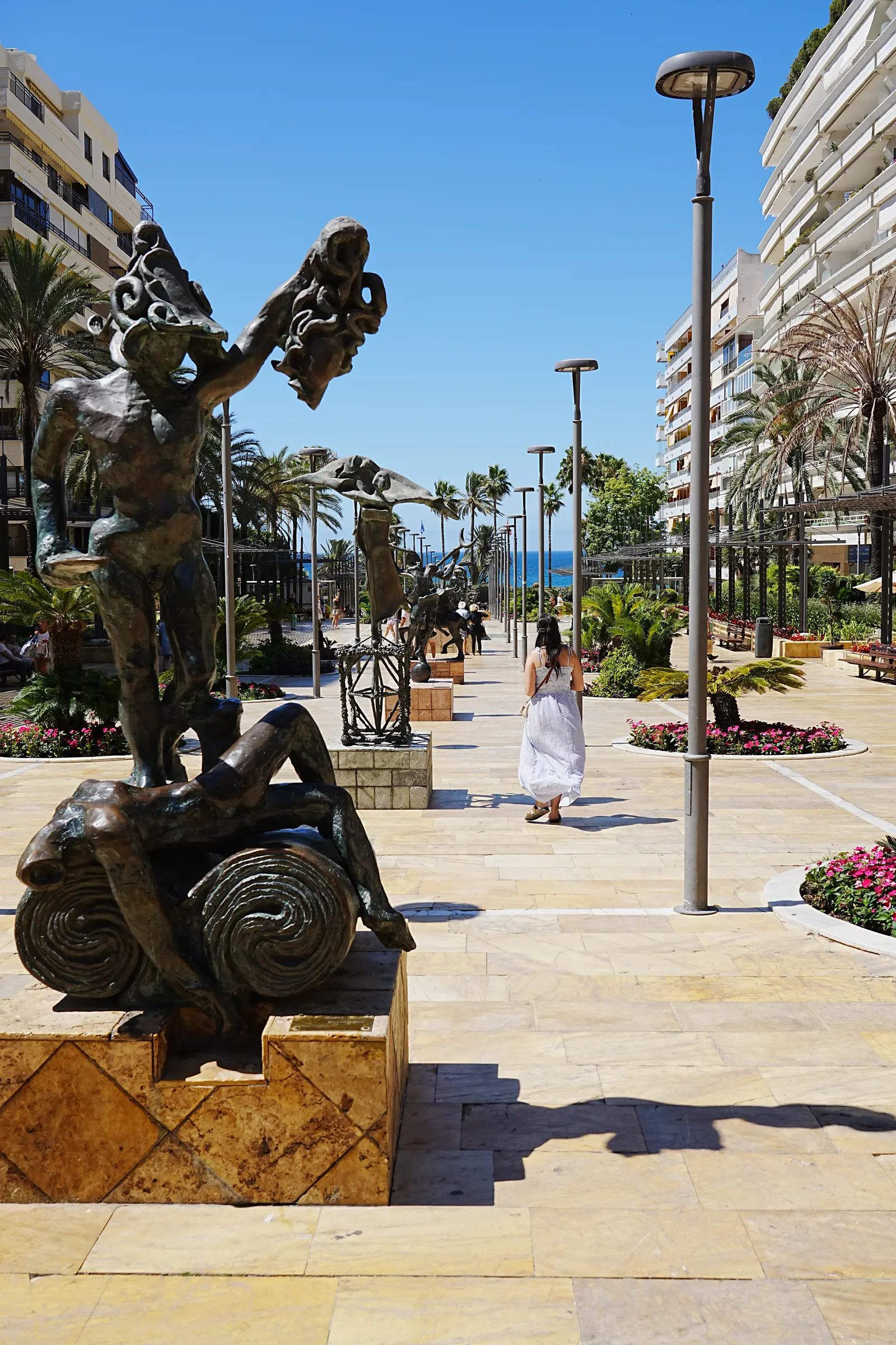 Bronze Salvador Dalí sculptures lining the Avenida del Mar promenade in Marbella