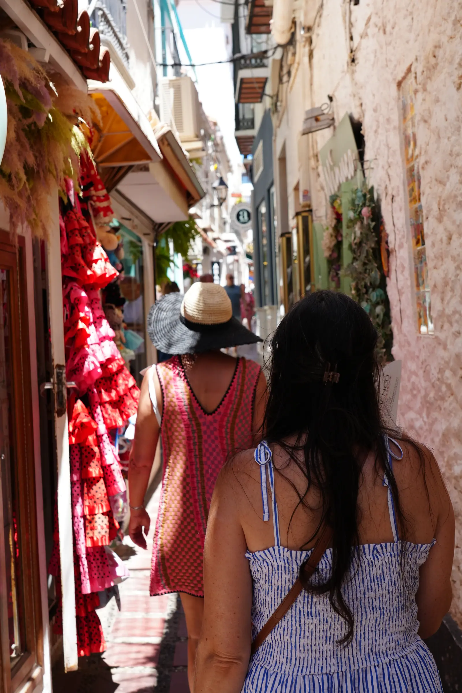 Women walking down a street in Marbella's Old Town