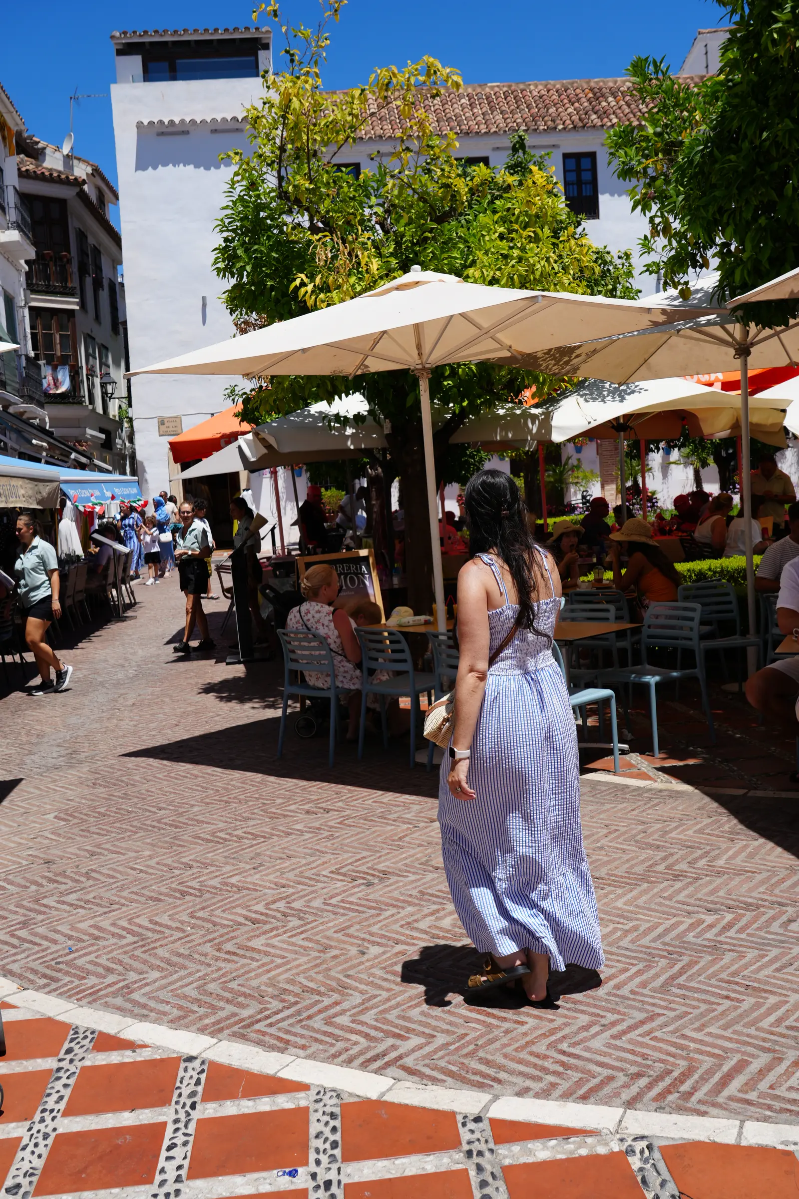 Plaza de los Naranjos in Marbella lined with orange trees and cafe terraces