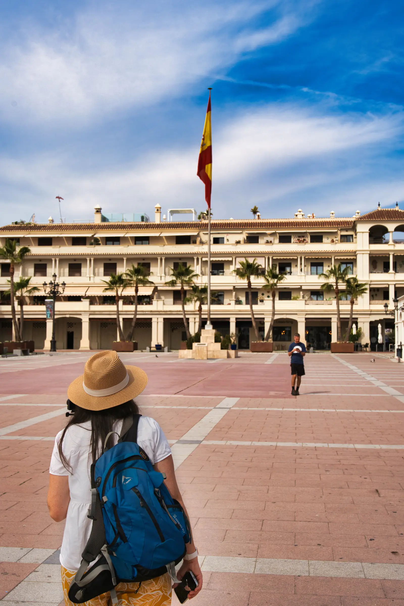 heidi walking through plaza de espana in Nerja