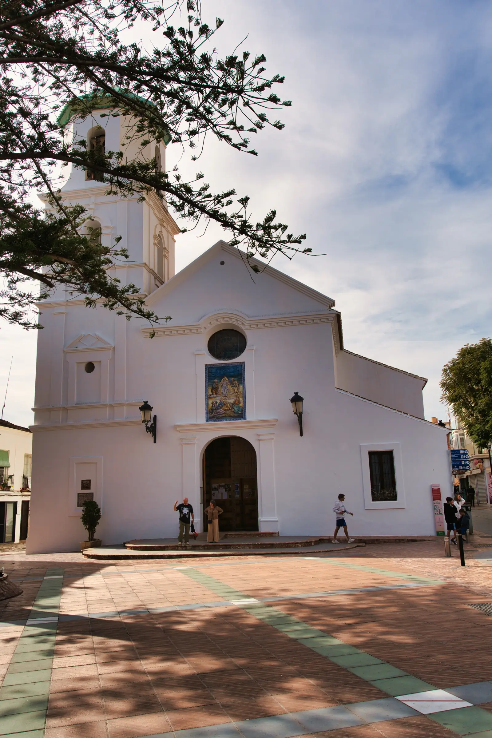 The white El Salvador church in Nerja old town.