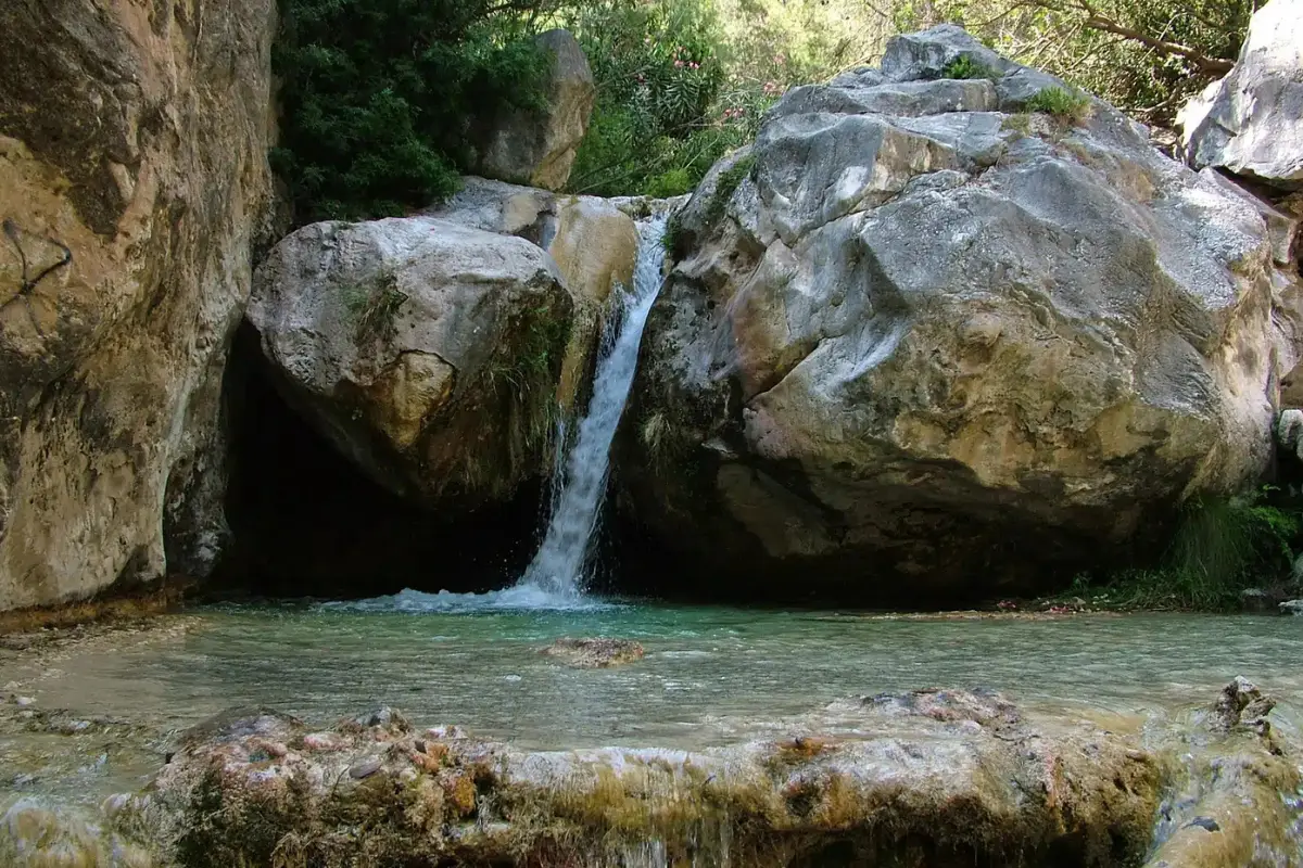 The natural pool at Poza de los Patos on the Río Chíllar route near Nerja