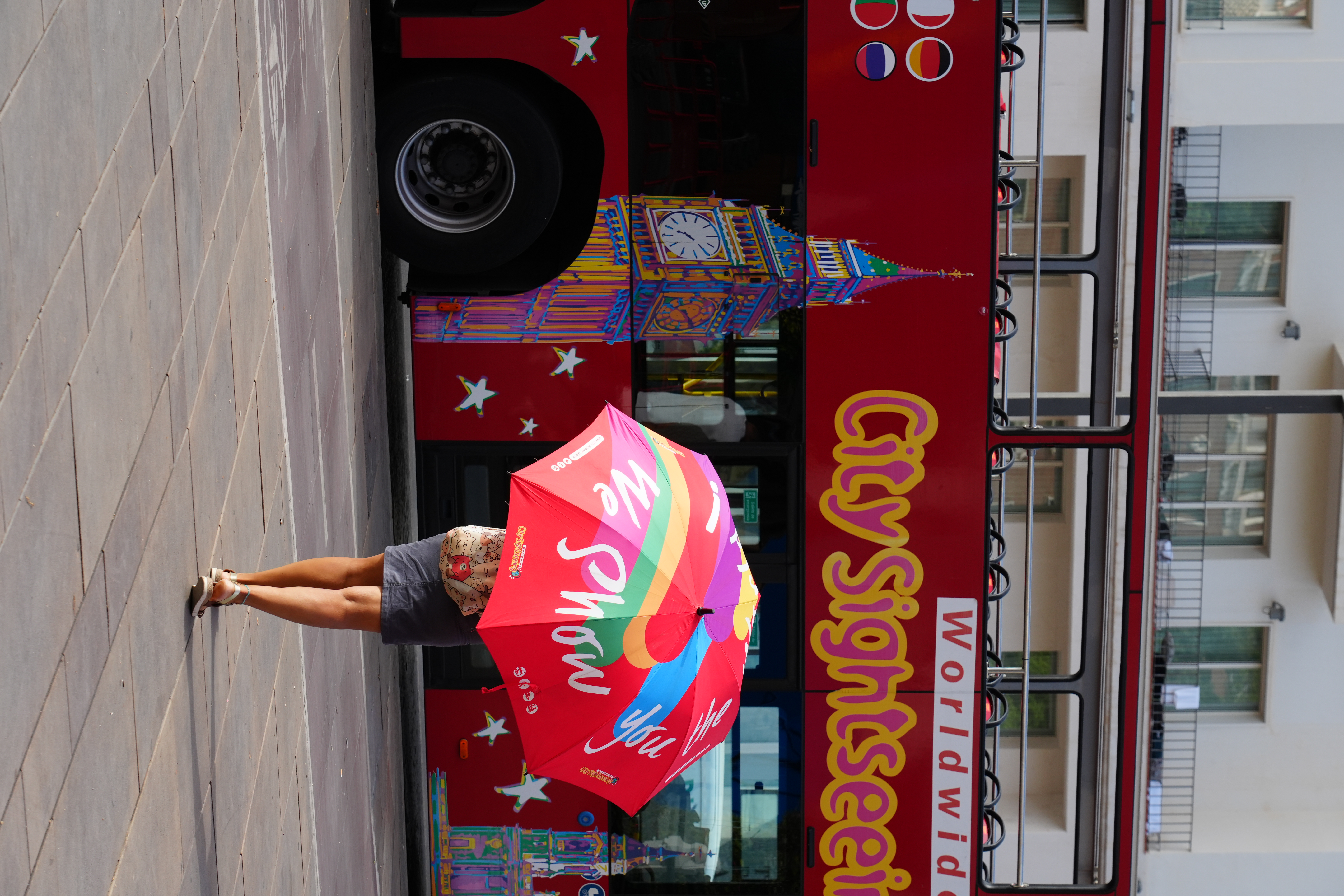 The City Sightseeing tour bus parked on a Malaga street