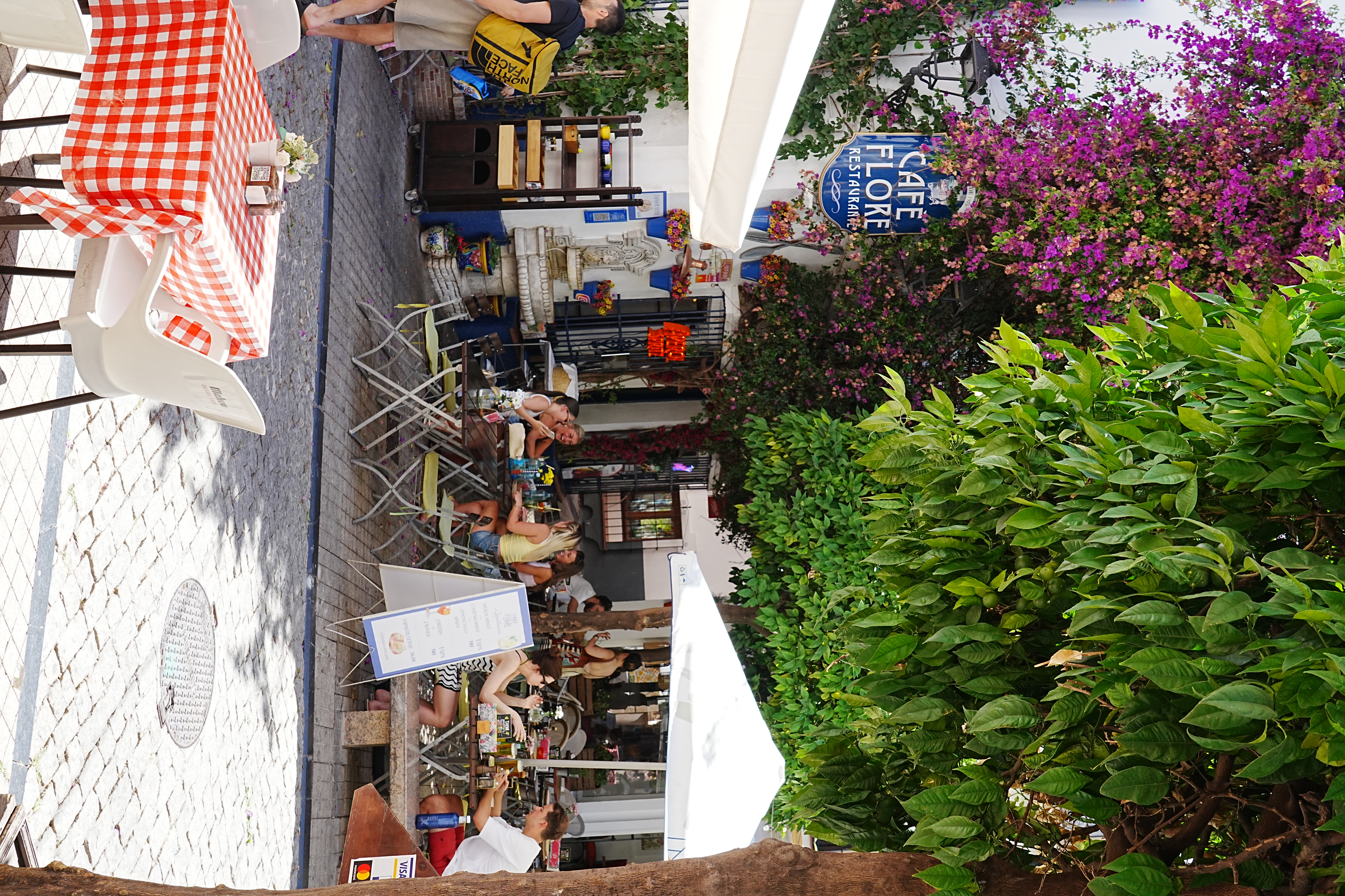 Diners at Cafe Flore's terrace in Marbella's Old Town