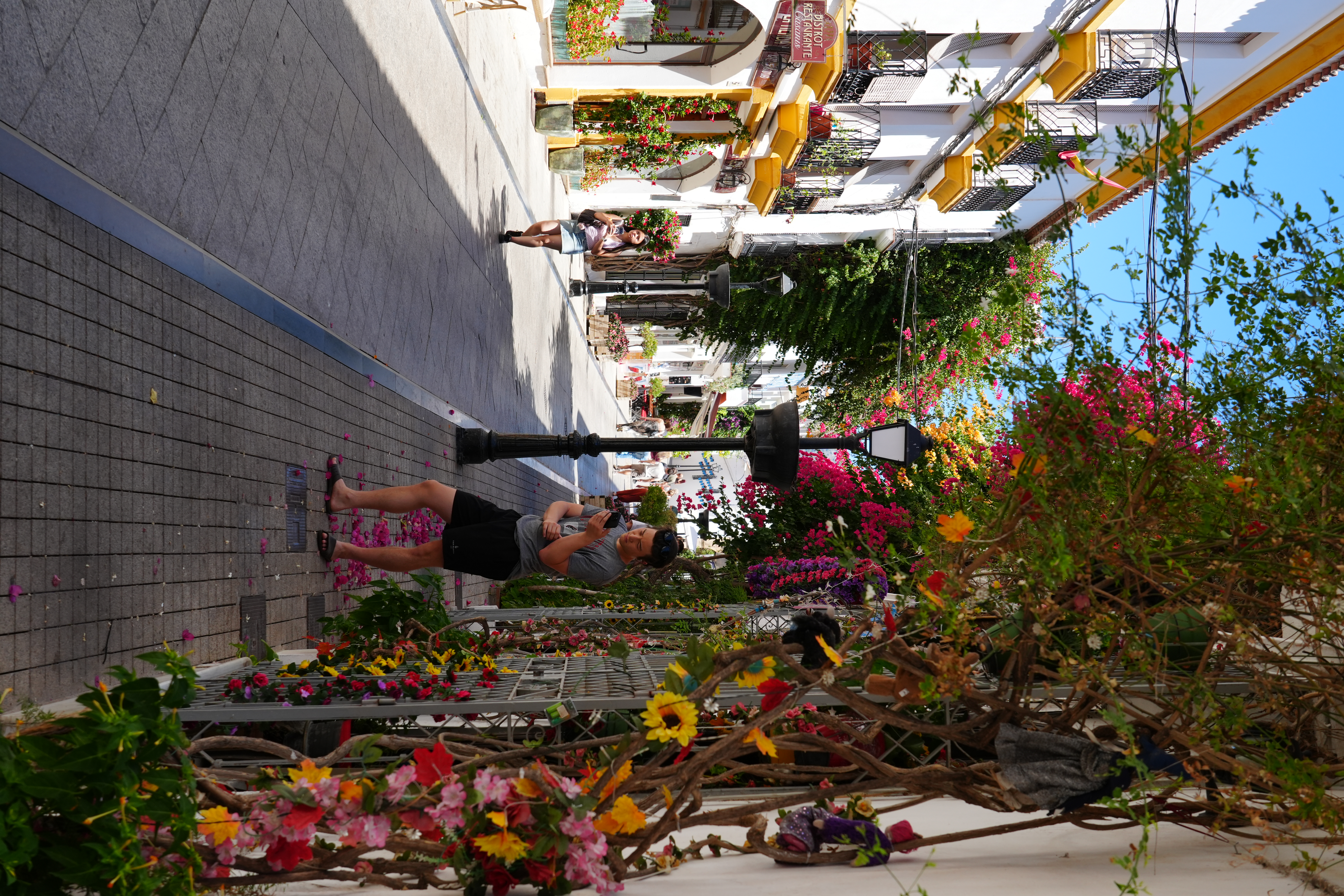A flower-decorated street in Marbella's Old Town