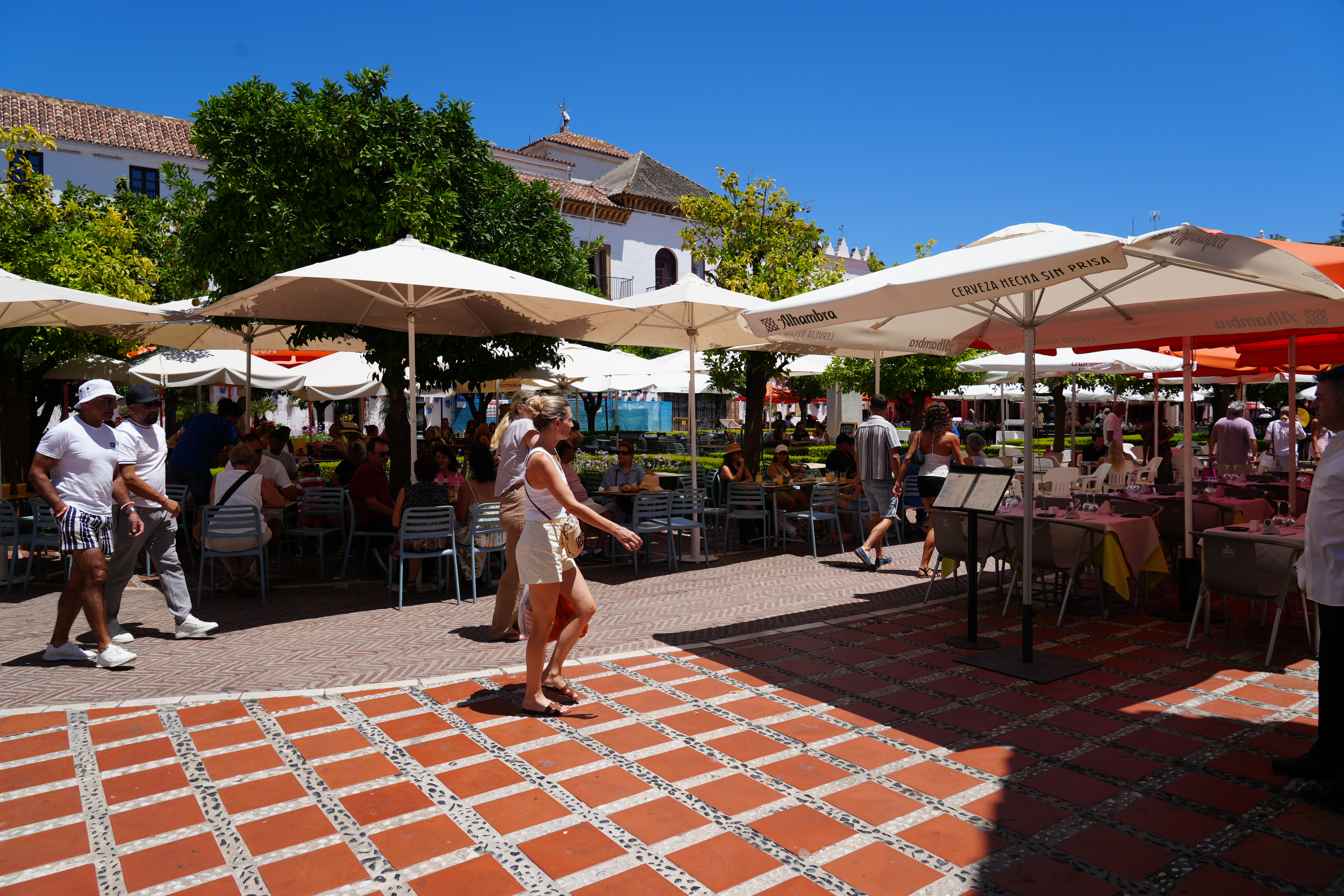 Plaza de los Naranjos in Marbella, lined with cafe terraces under orange trees