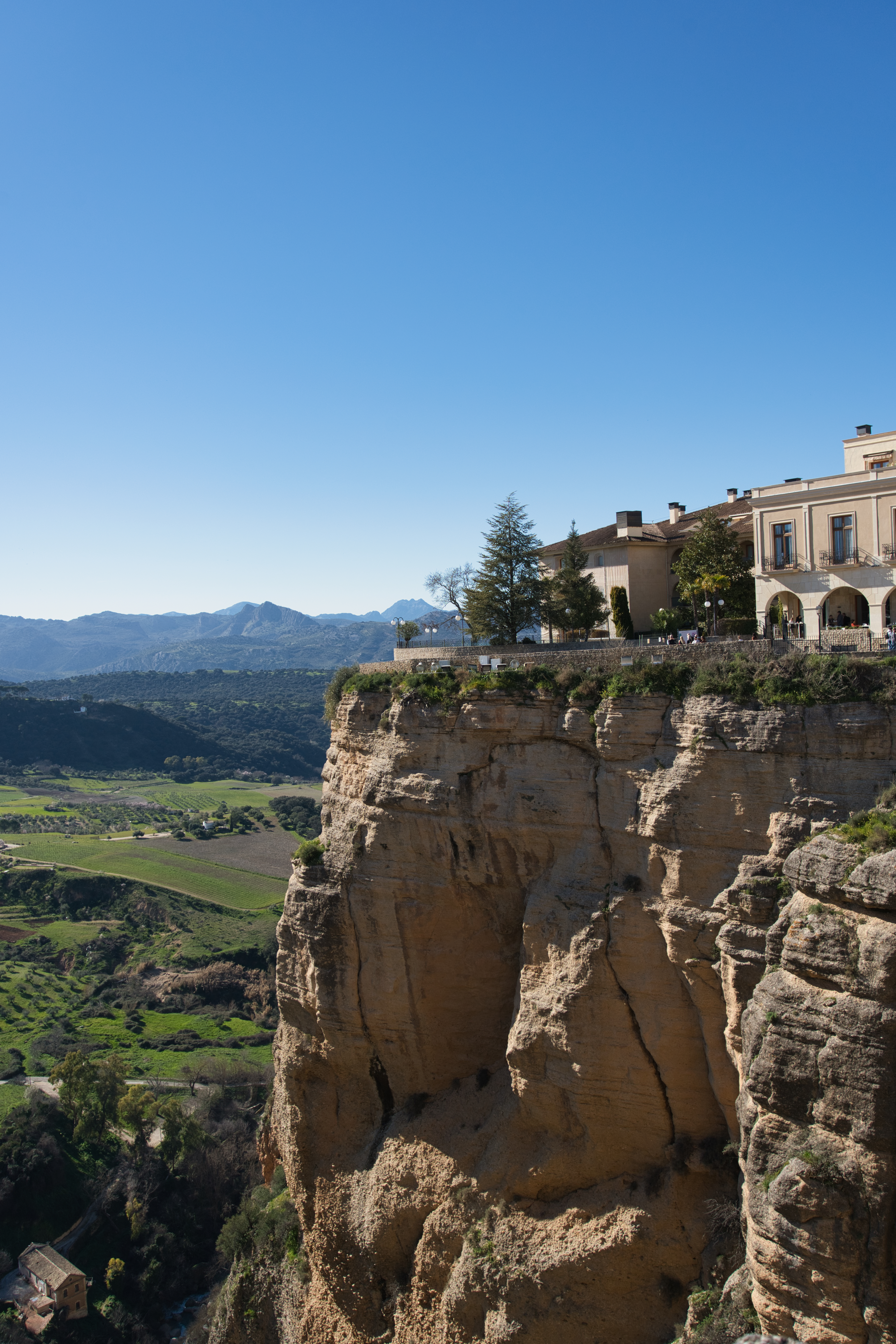 The sheer cliff edge below Ronda's Parador, with the valley beyond