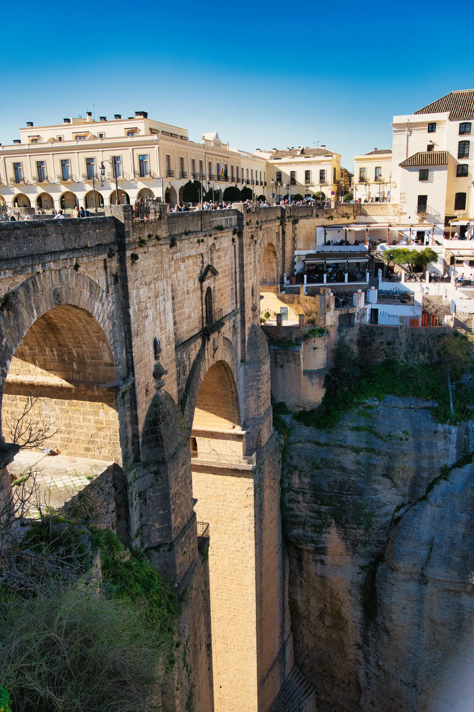 The Puente Nuevo bridge in Ronda with restaurants on the gorge edge