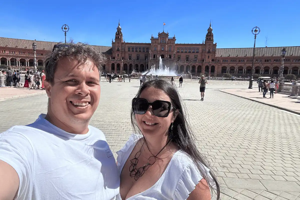 Heidi and Jethro are standing outside the Plaza de España in Seville.