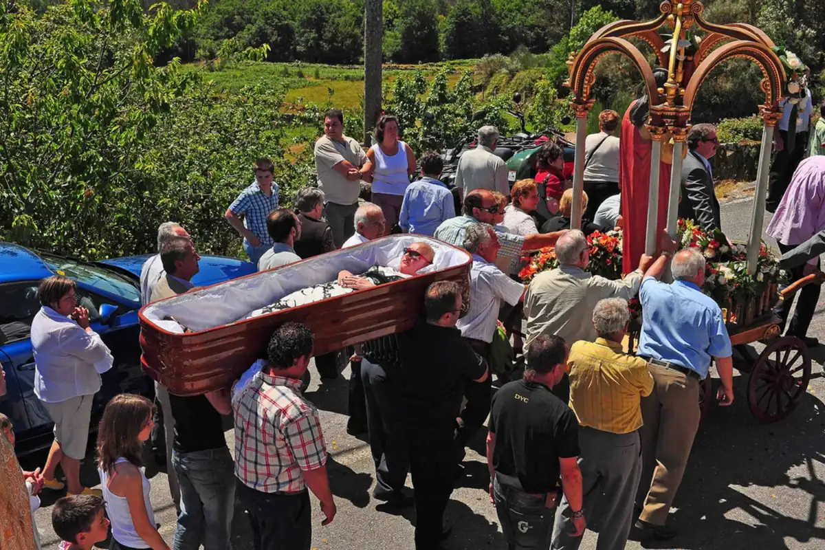 Coffin procession through Las Nieves during the Fiesta de Santa Marta de Ribarteme