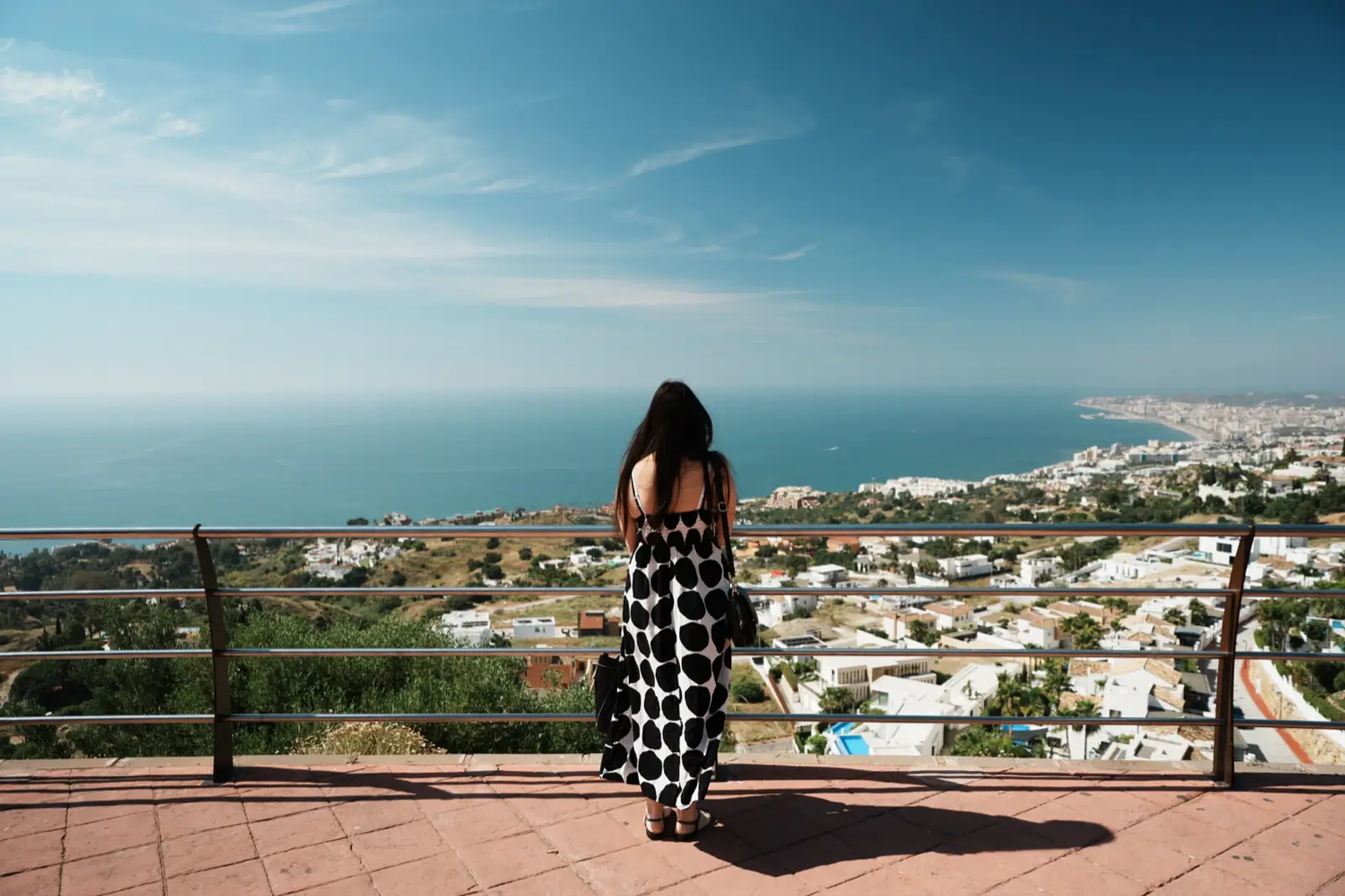Heidi at the mirador viewpoint beside the Stupa of Enlightenment, looking out over the Benalmadena coast