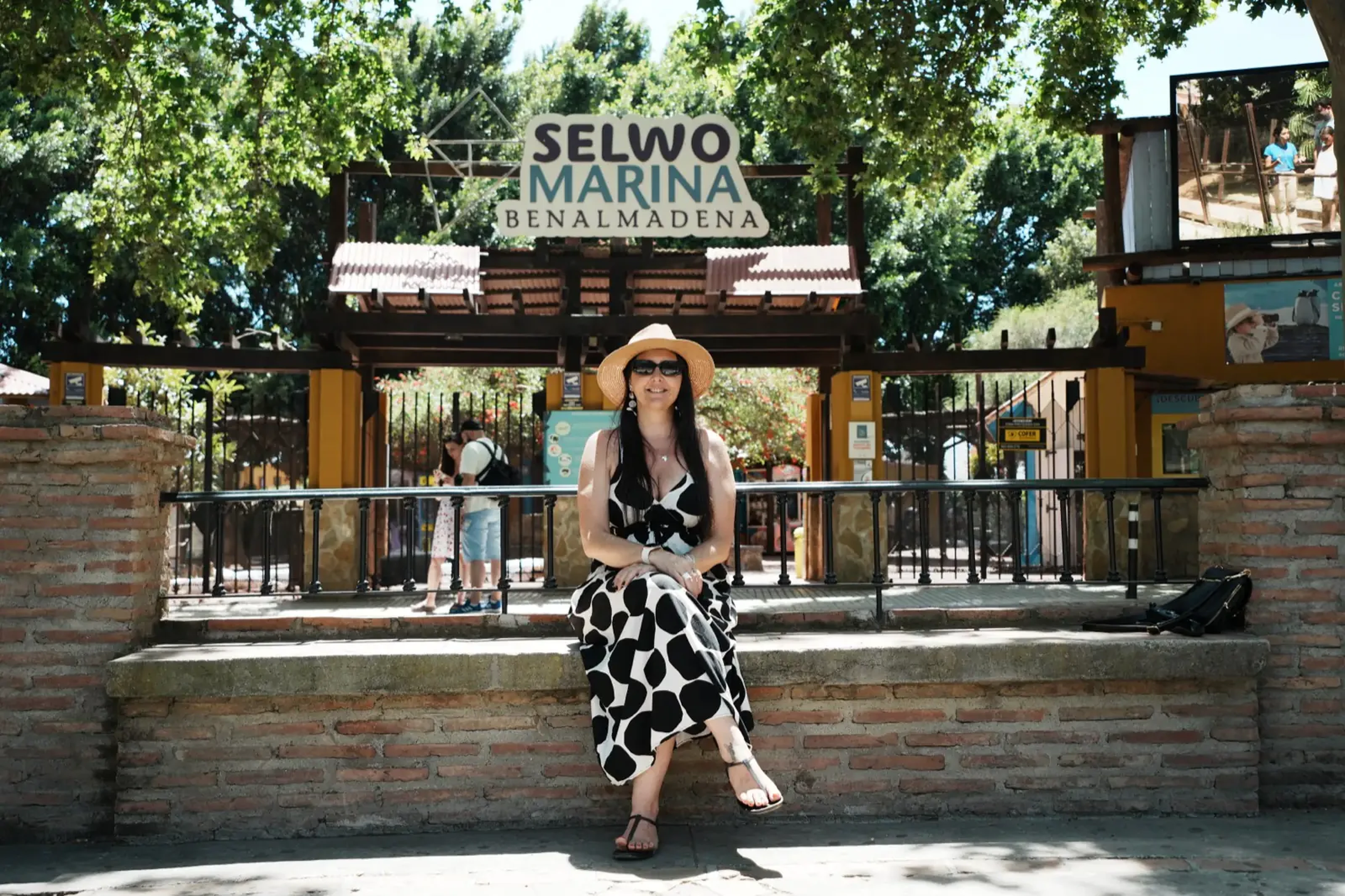 Heidi posing outside the entrance to Selwo Marina in Benalmadena