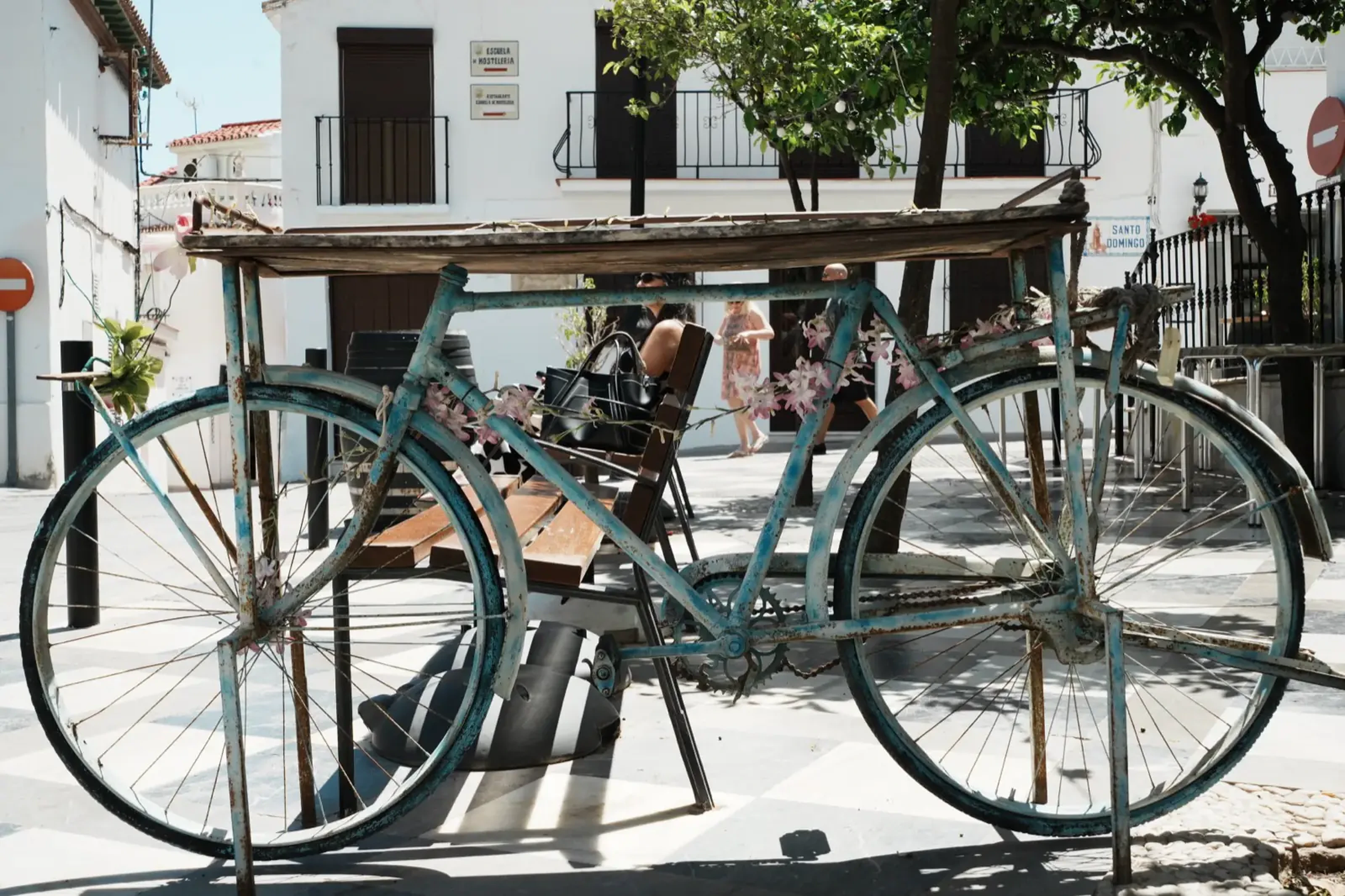 A vintage decorative bicycle in a sunny plaza in Benalmadena Pueblo