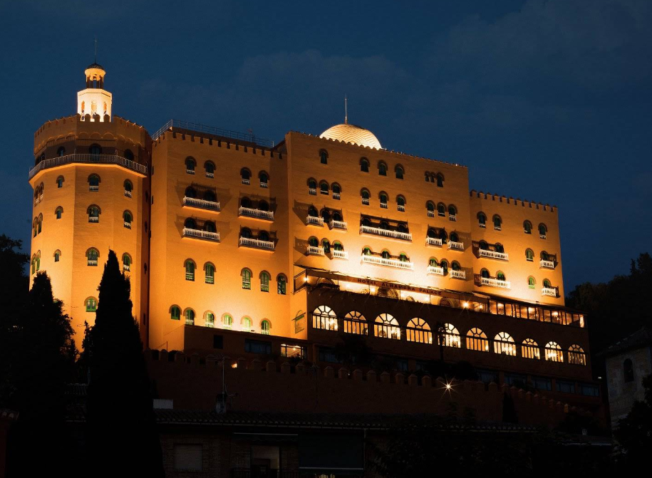 Hotel Alhambra Palace with its Moorish-inspired facade overlooking Granada