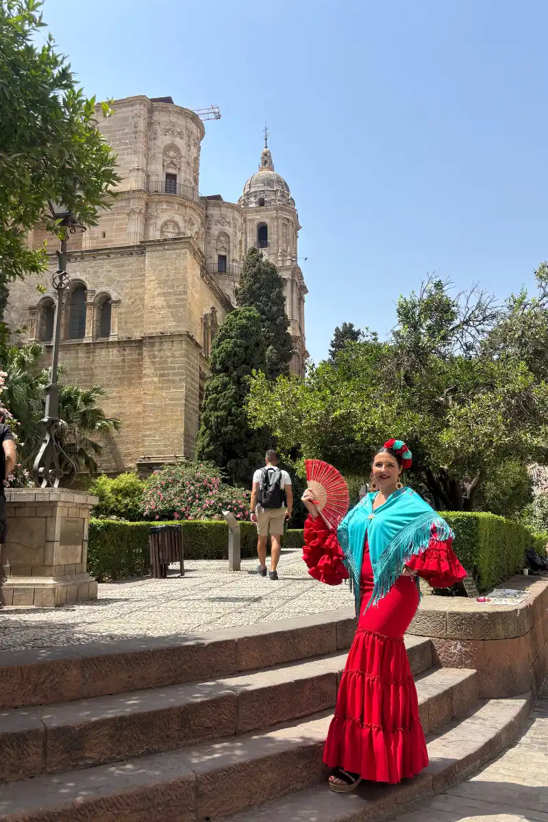 Heidi in flamenco dress outside Malaga Cathedral during the Feria de Malaga