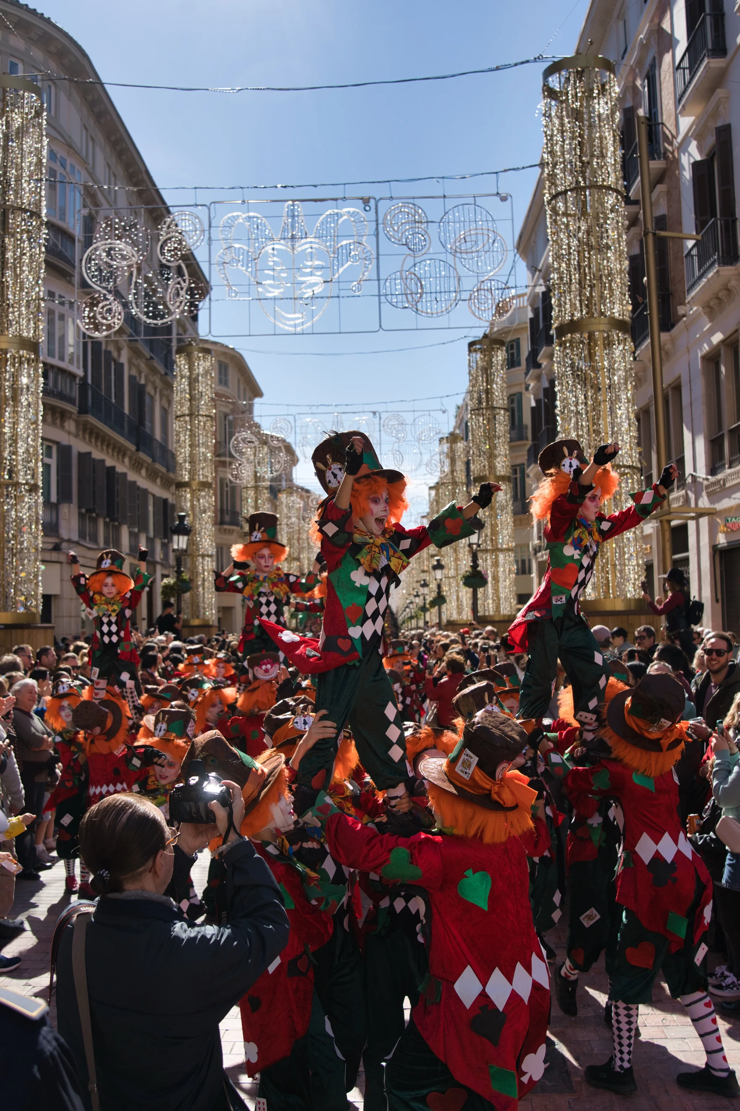 Carnival performers in Alice in Wonderland costumes