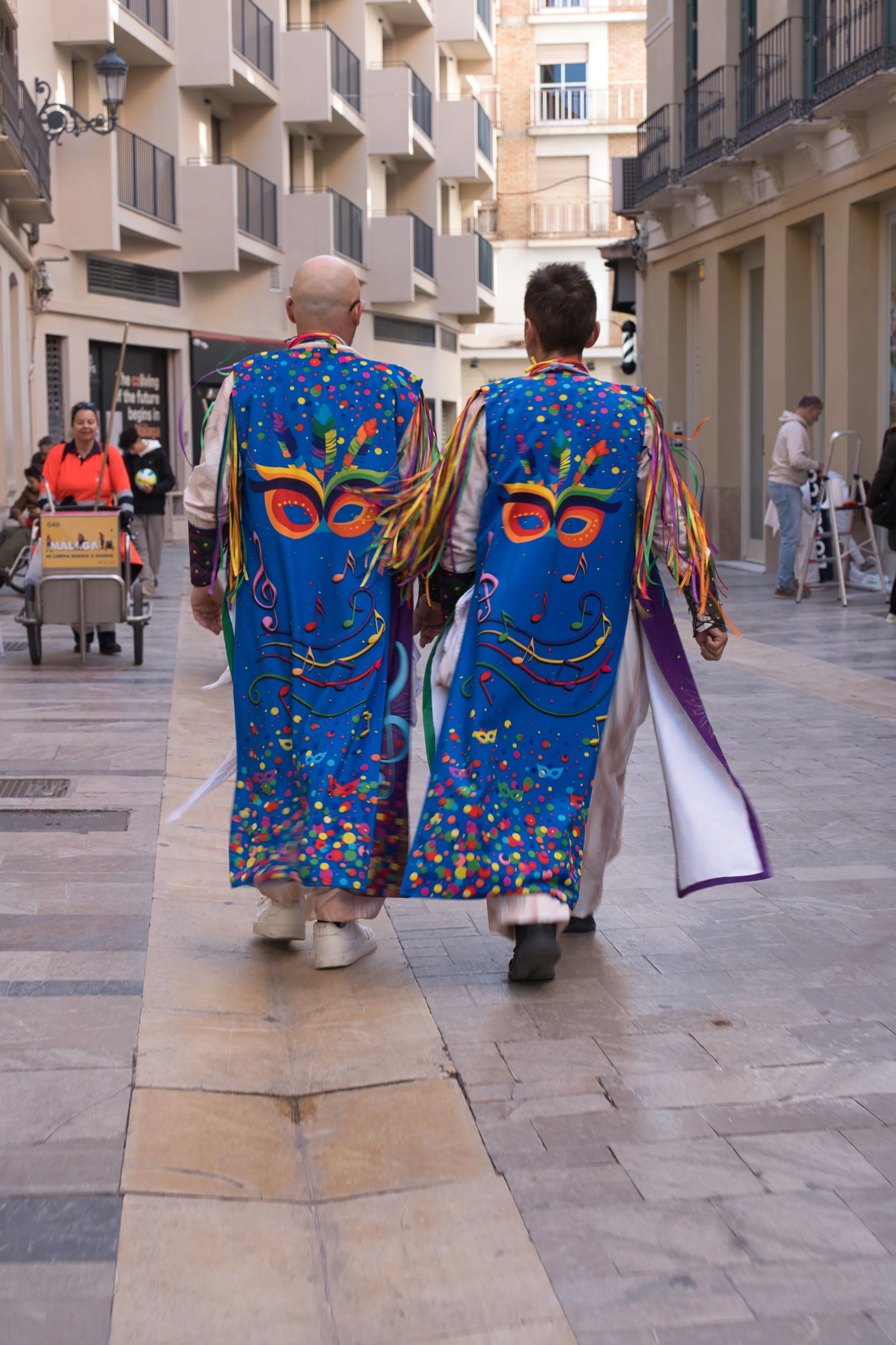 Two men in carnival costumes