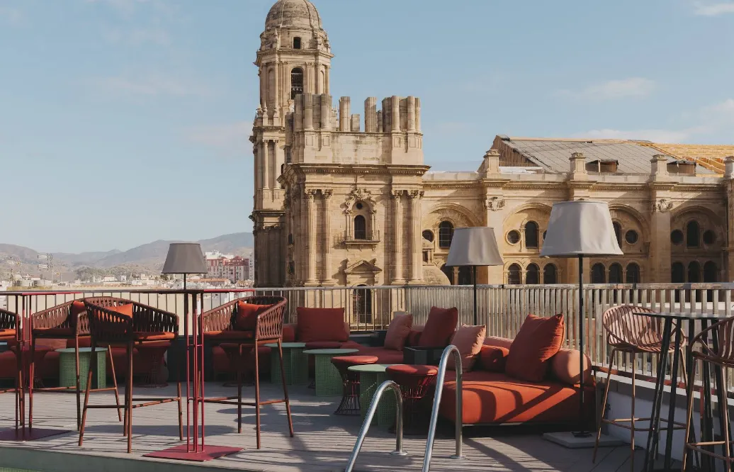 Molina Lario hotel rooftop terrace with views of Malaga Cathedral