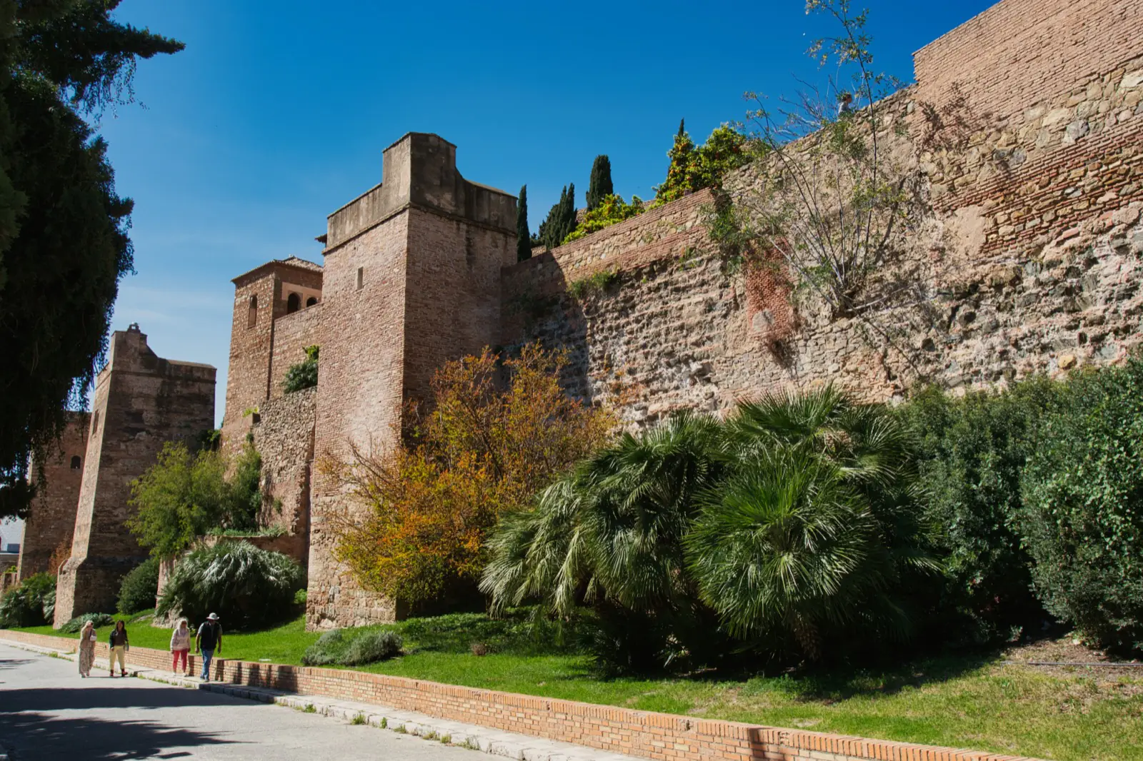 People walking near the Alcazaba.