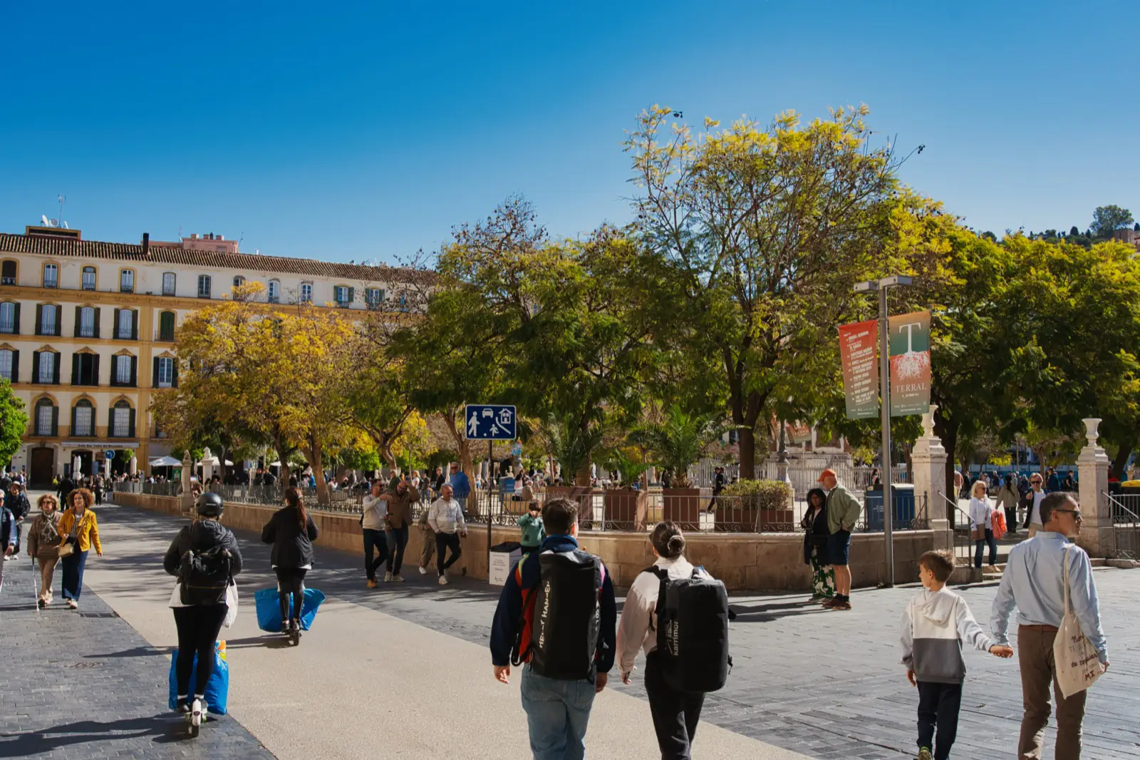Plaza de la Merced in Malaga with restaurants and the obelisk