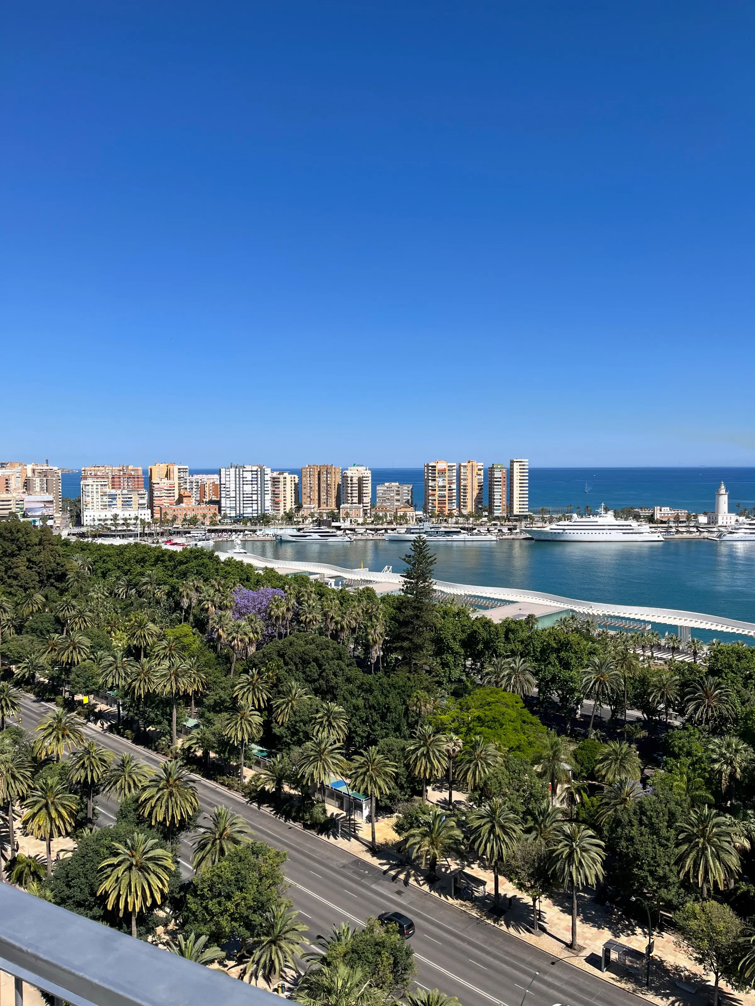 Malaga port from rooftop at sunset