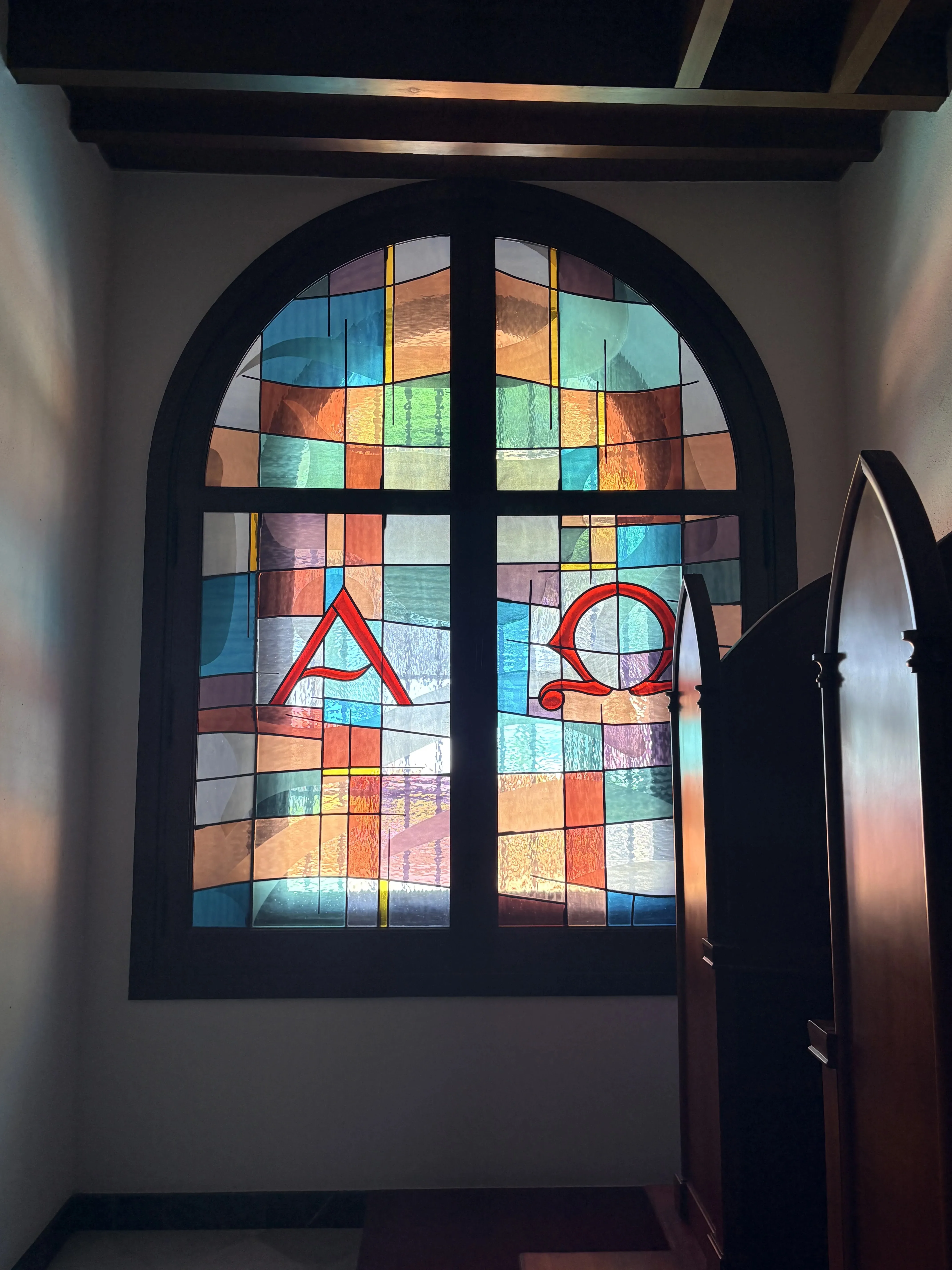 Colourful stained glass window inside a church in Mijas Pueblo