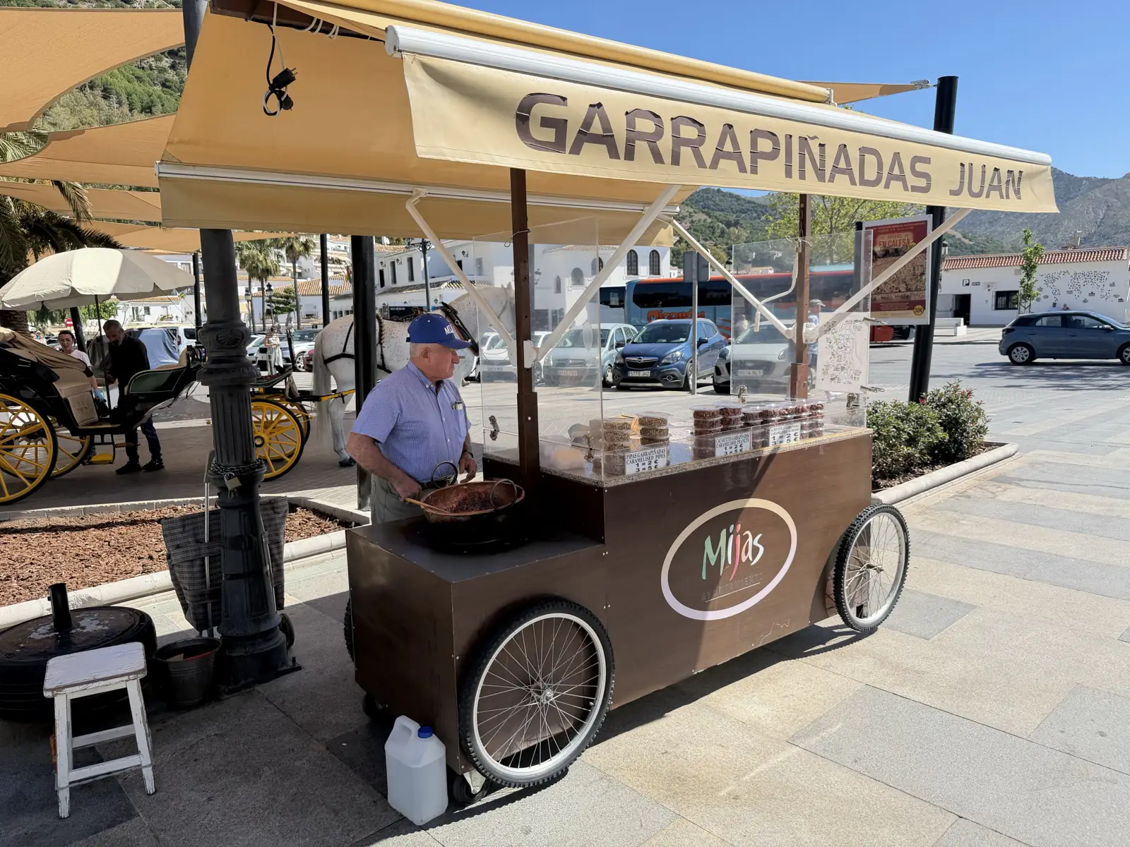 A nut seller at the Mijas Pueblo market