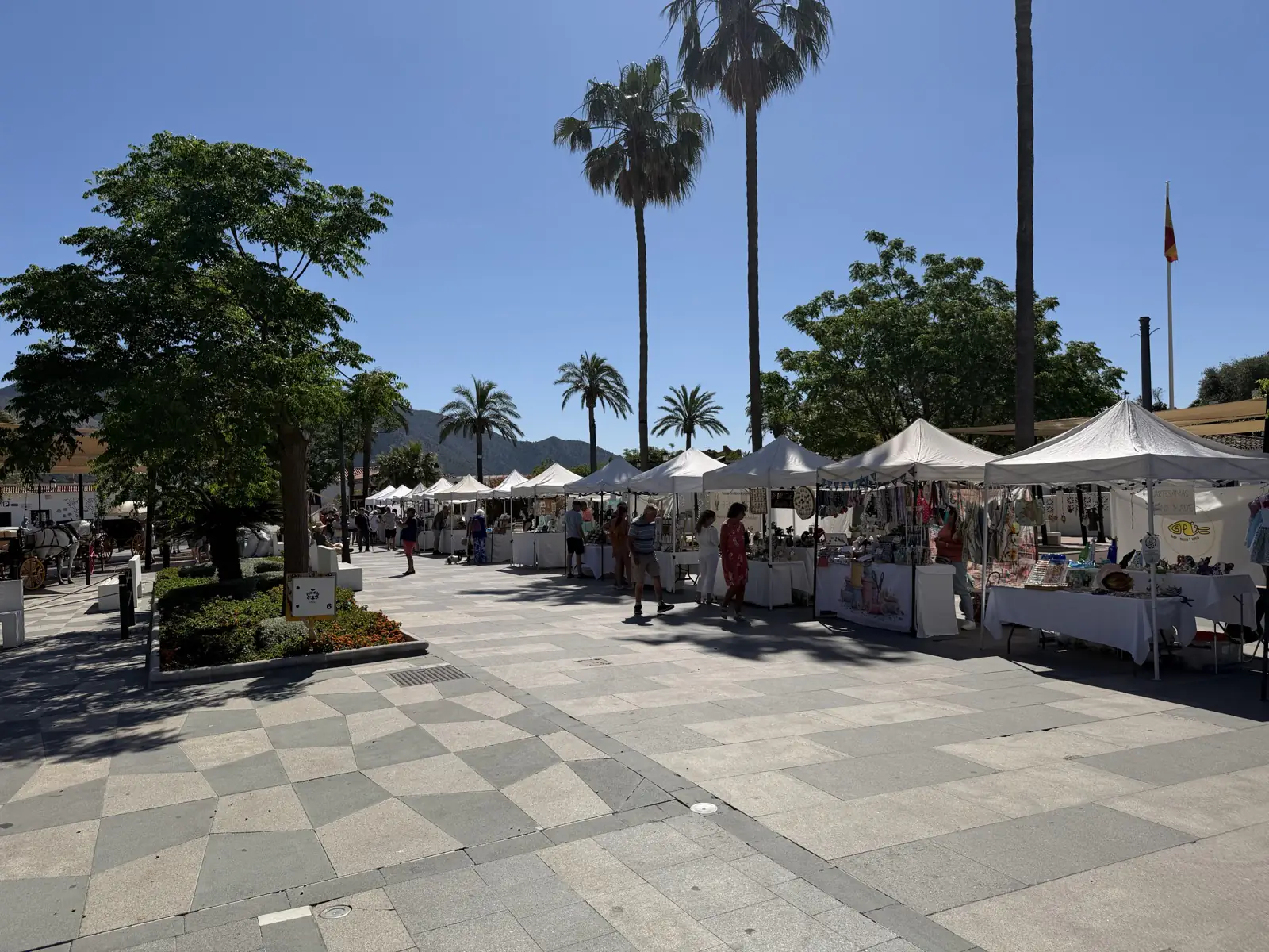 Wide view of the craft market stalls in Mijas Pueblo