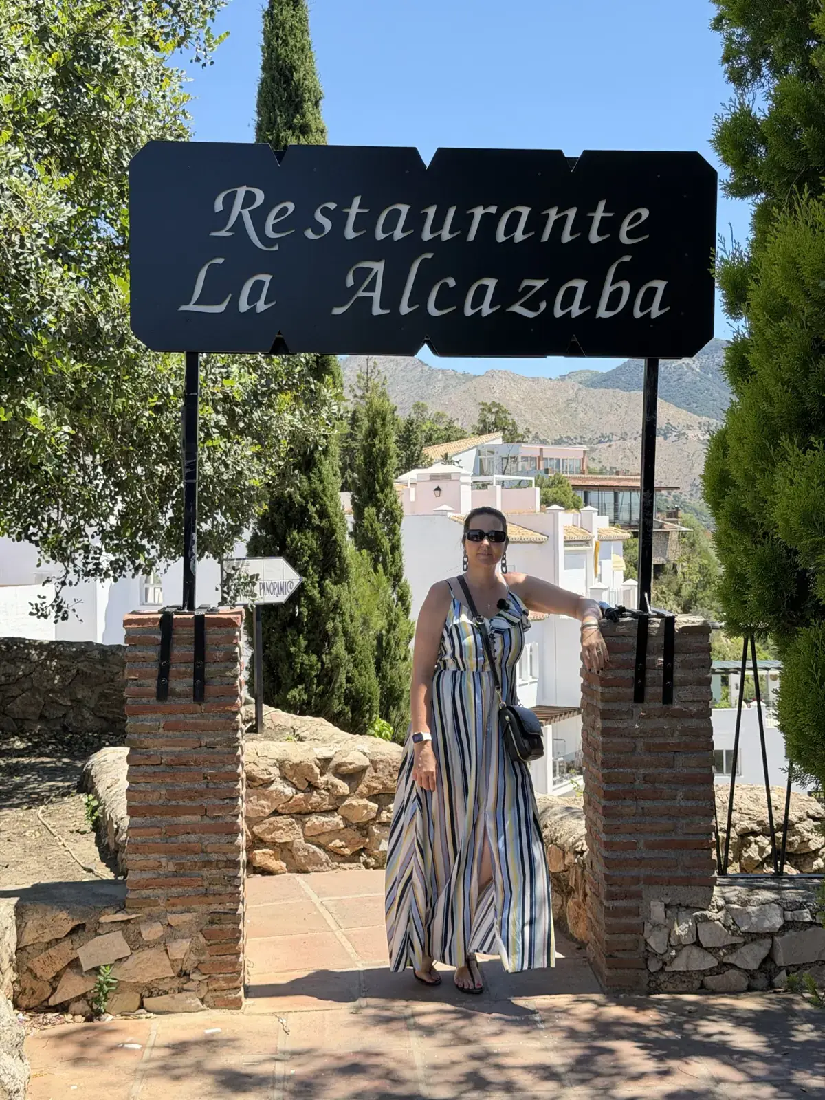 Heidi at the entrance to Restaurante La Alcazaba in Mijas Pueblo