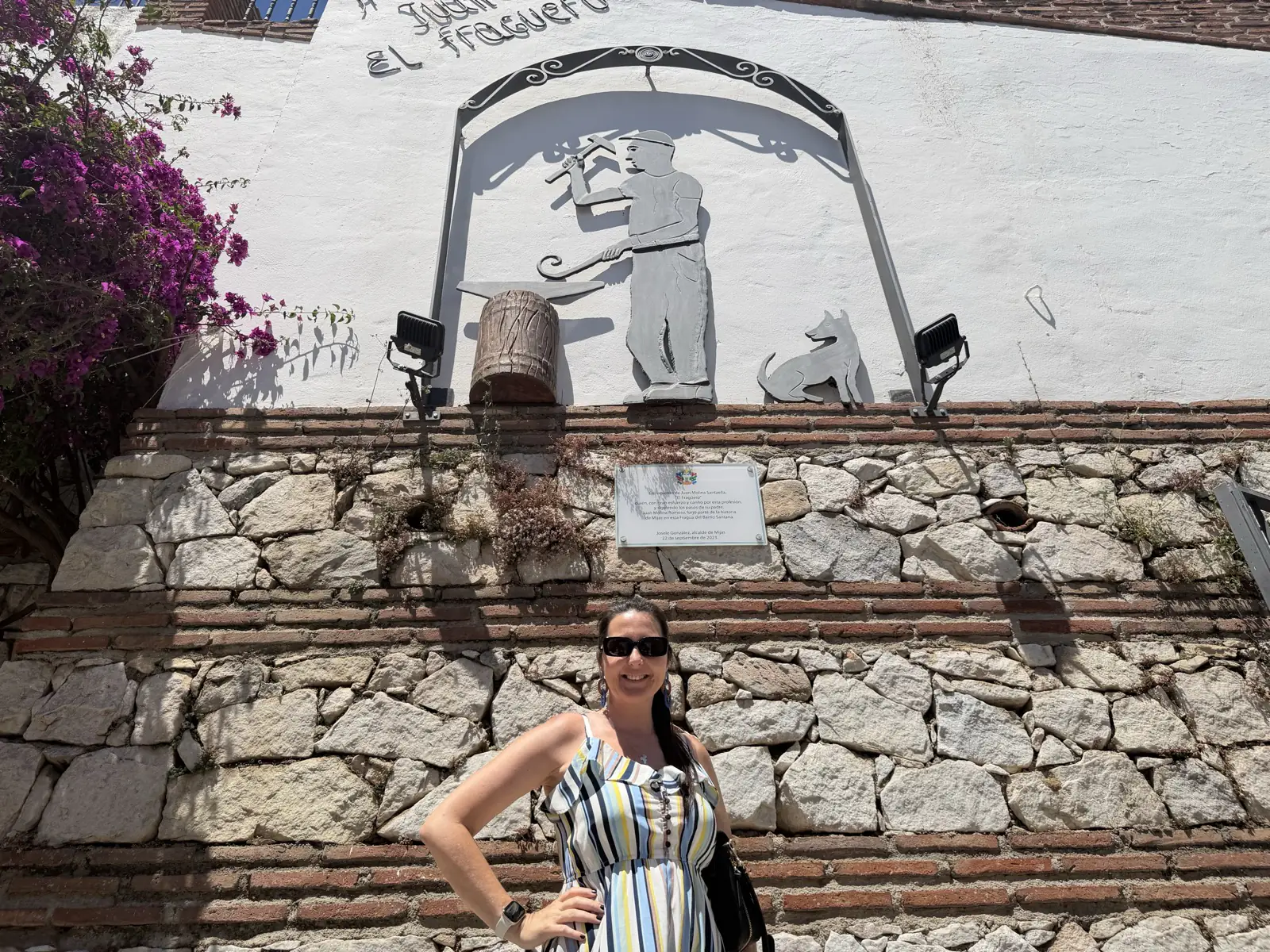 Sign outside the Santuario de la Virgen de la Peña cave shrine in Mijas Pueblo