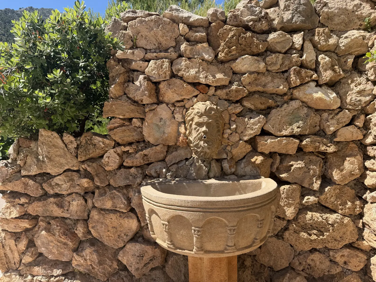 Stone fountain outside the Santuario de la Virgen de la Peña in Mijas Pueblo