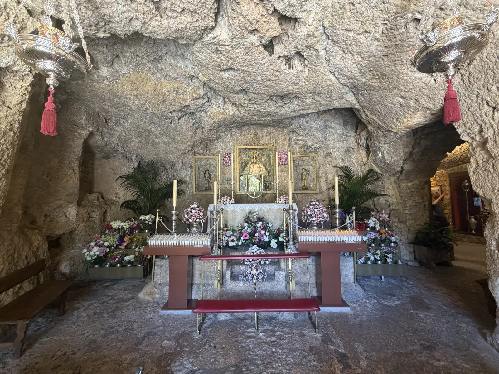 The interior of the Santuario de la Virgen de la Peña cave shrine in Mijas Pueblo