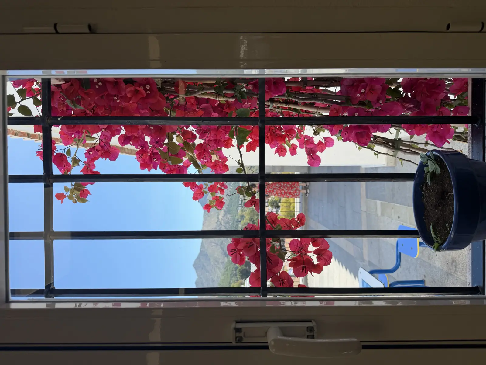 Pretty view from a window in Mijas Pueblo looking out over the whitewashed streets