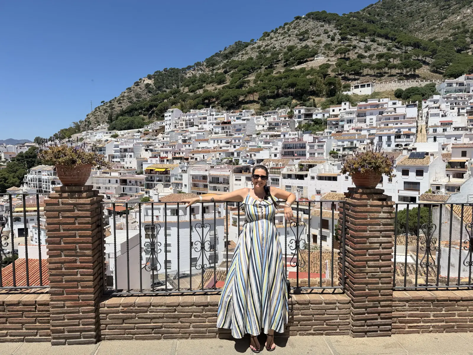 Selfie with the whitewashed village of Mijas Pueblo in the background