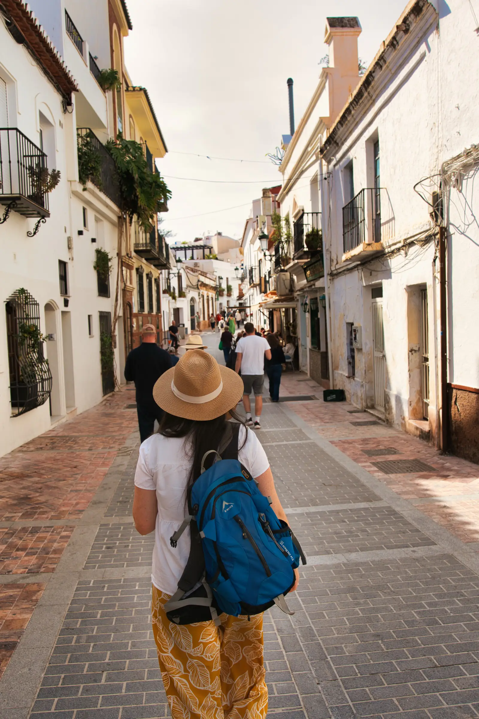 Walking through Nerja old town streets