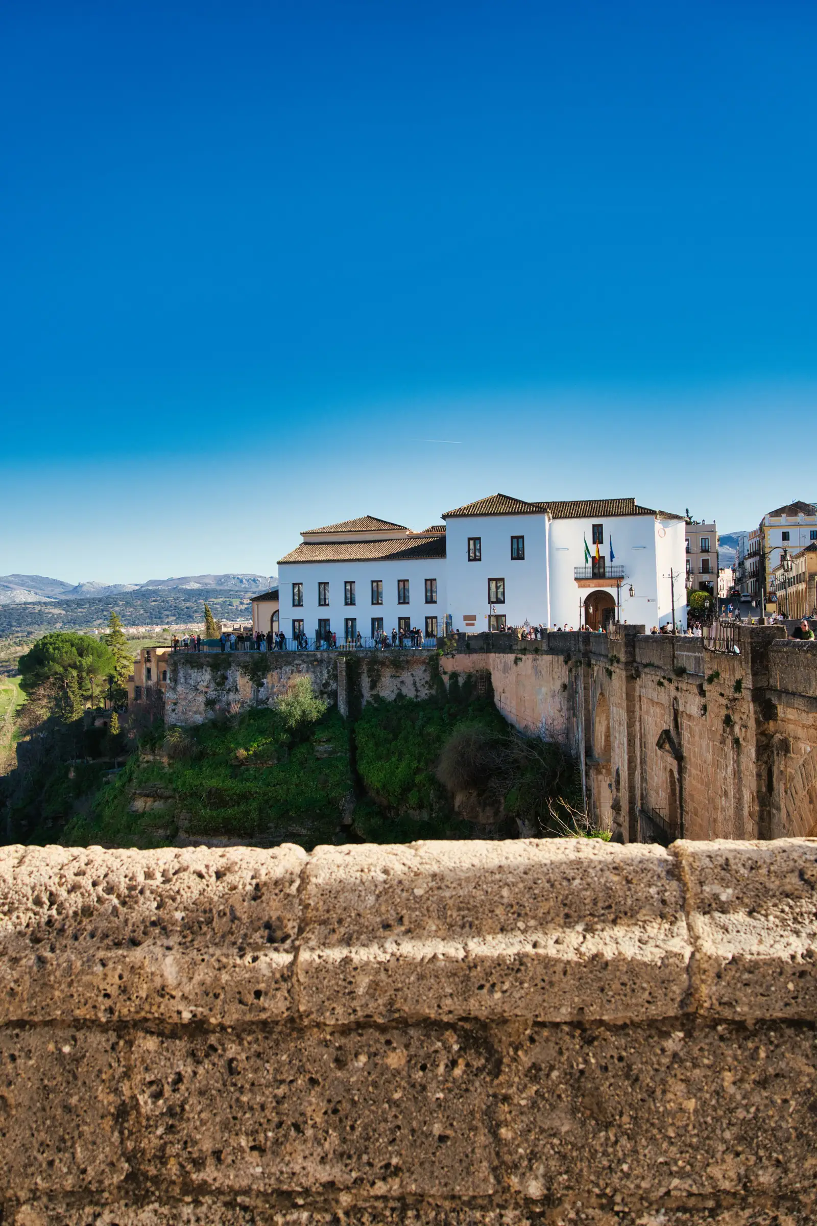 Ronda from the side showing cliff-edge apartments